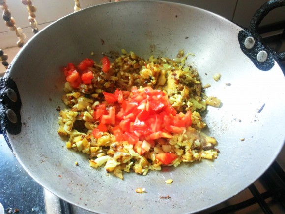 Add potato, cabbage and tomato