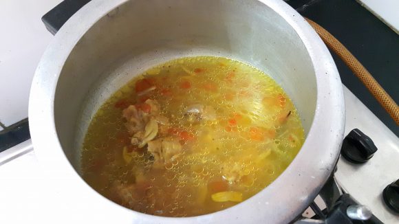 Stir the soup like pressing manner