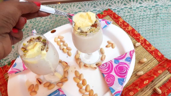 garnish with a hip spoon of malai