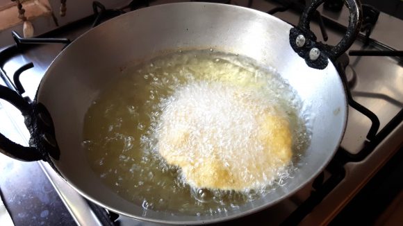 Deep fry the poori 