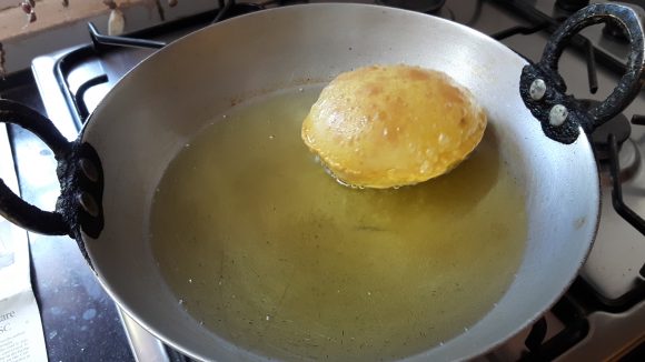 Deep fry the poori 