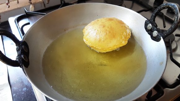 Deep fry the poori 