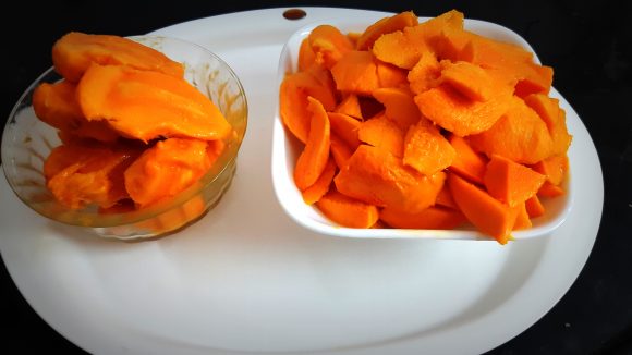 Peel off mangoes, cut into pieces, discard seeds