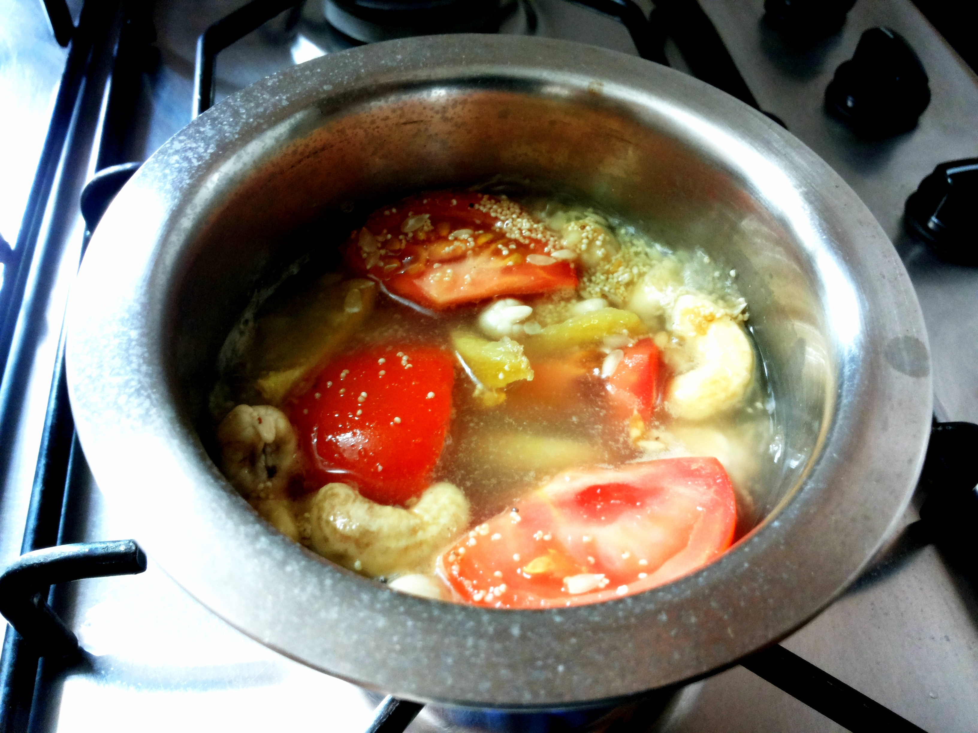 Boil cashew nut, poppy seed, melon seed and tomato