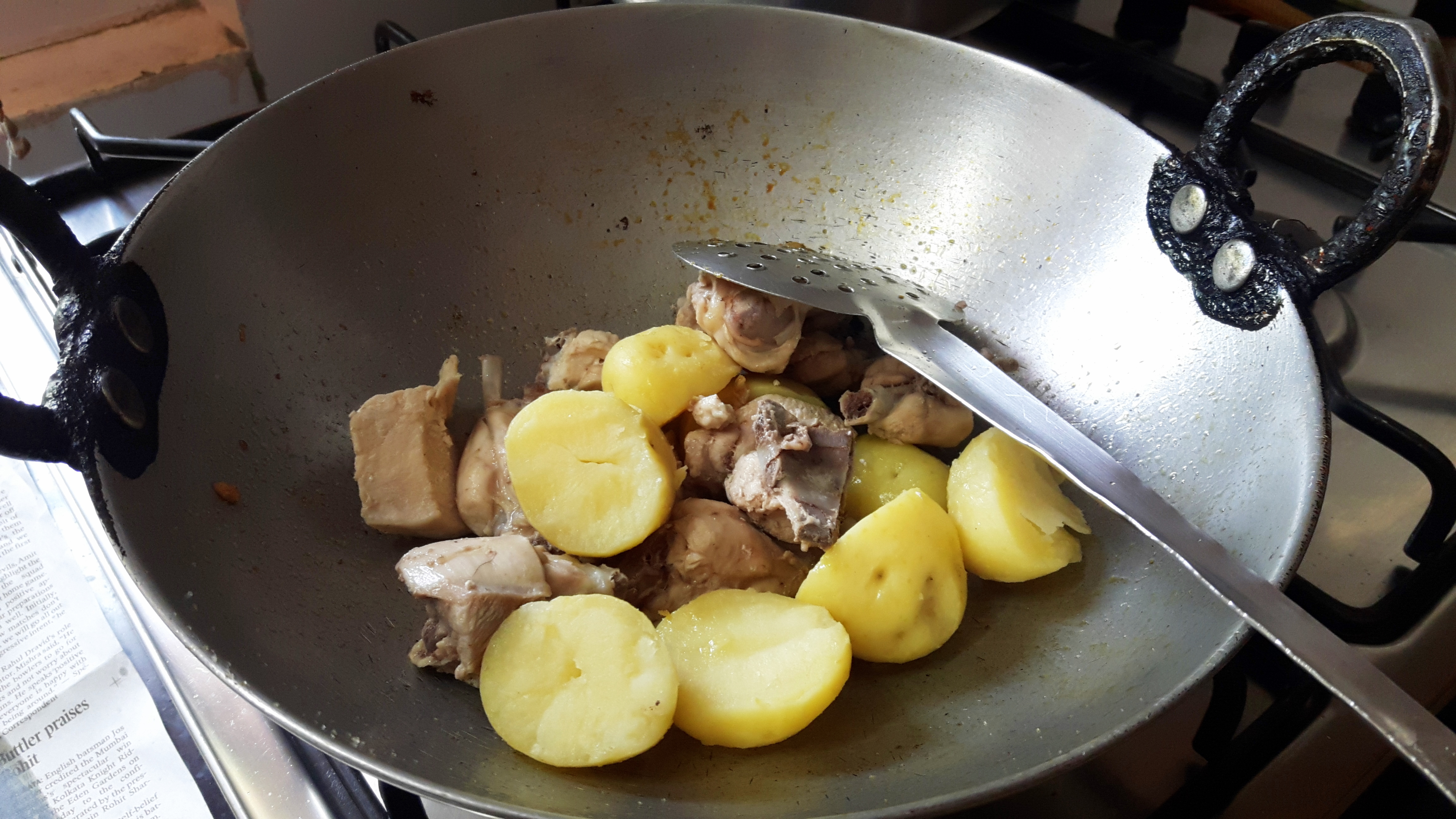 Add boiled chicken and potatoes