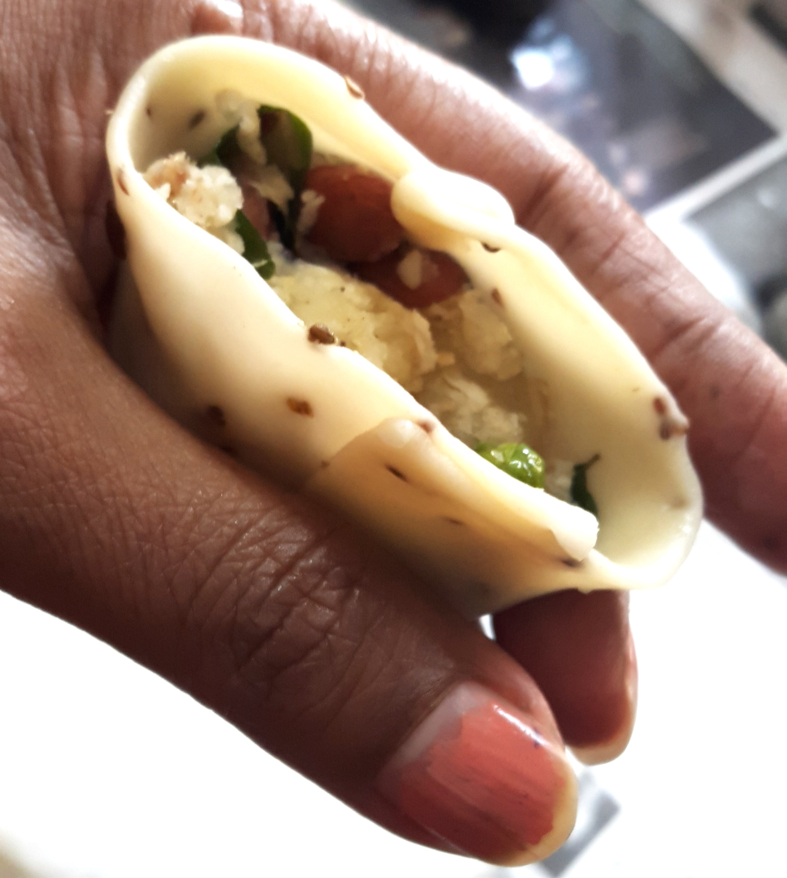 wet finger helps to join two surfaces easily), fill the stuffing in this cone
