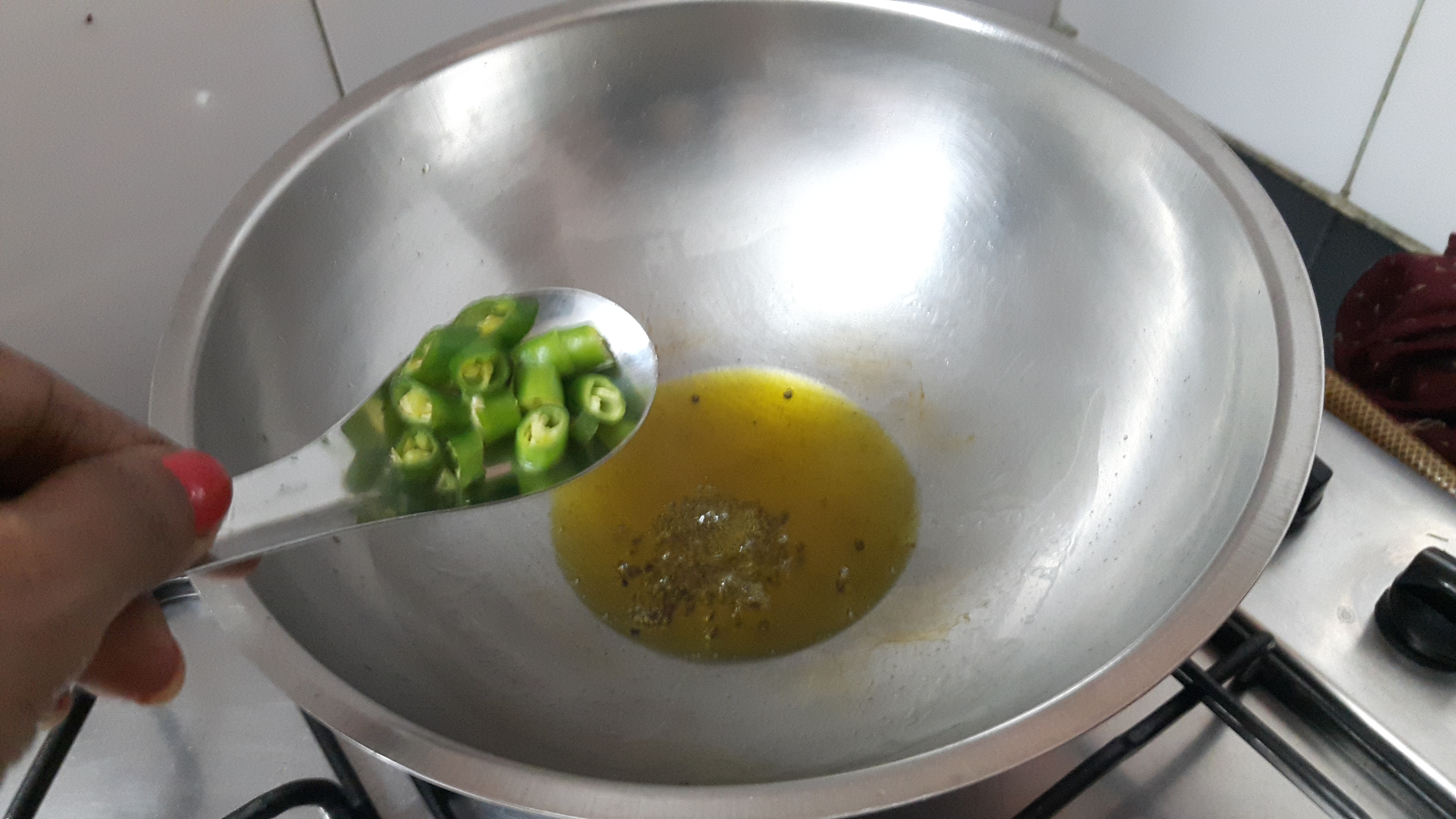 Add chopped green chili