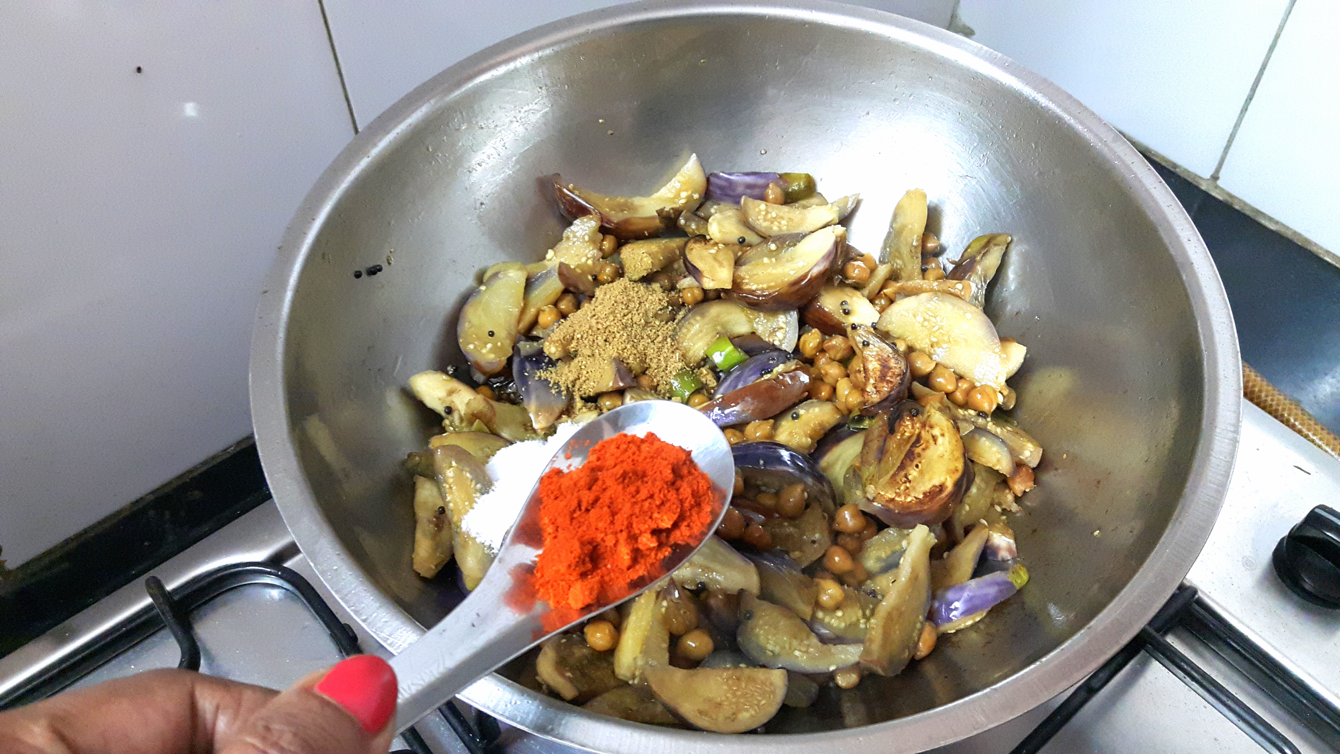 garlic paste, chili powder, turmeric powder, coriander powder and salt