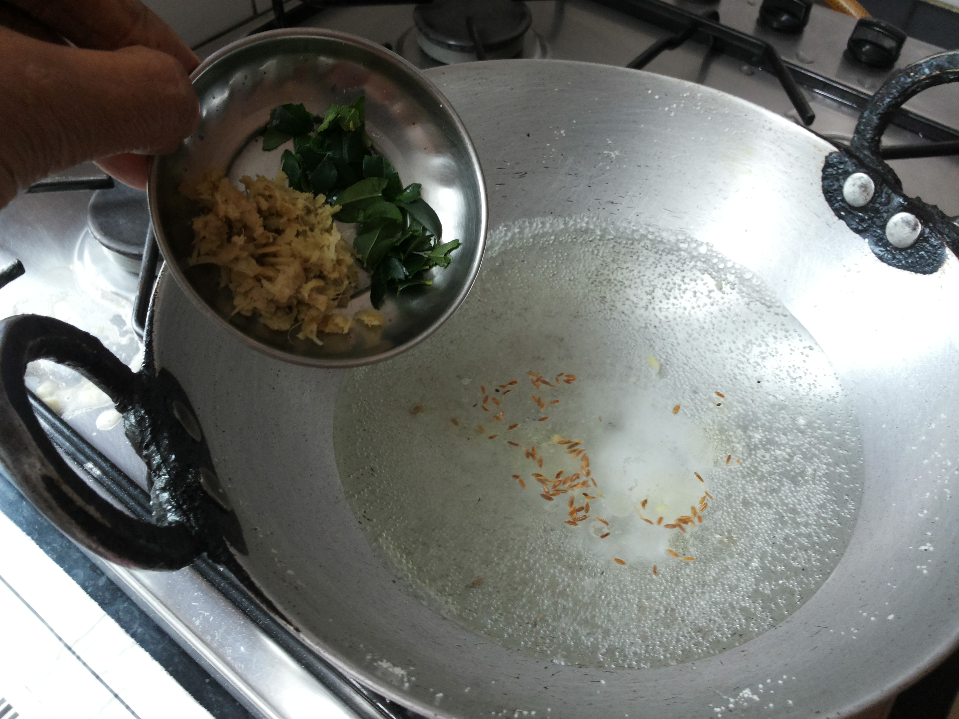 Add salt, grated ginger