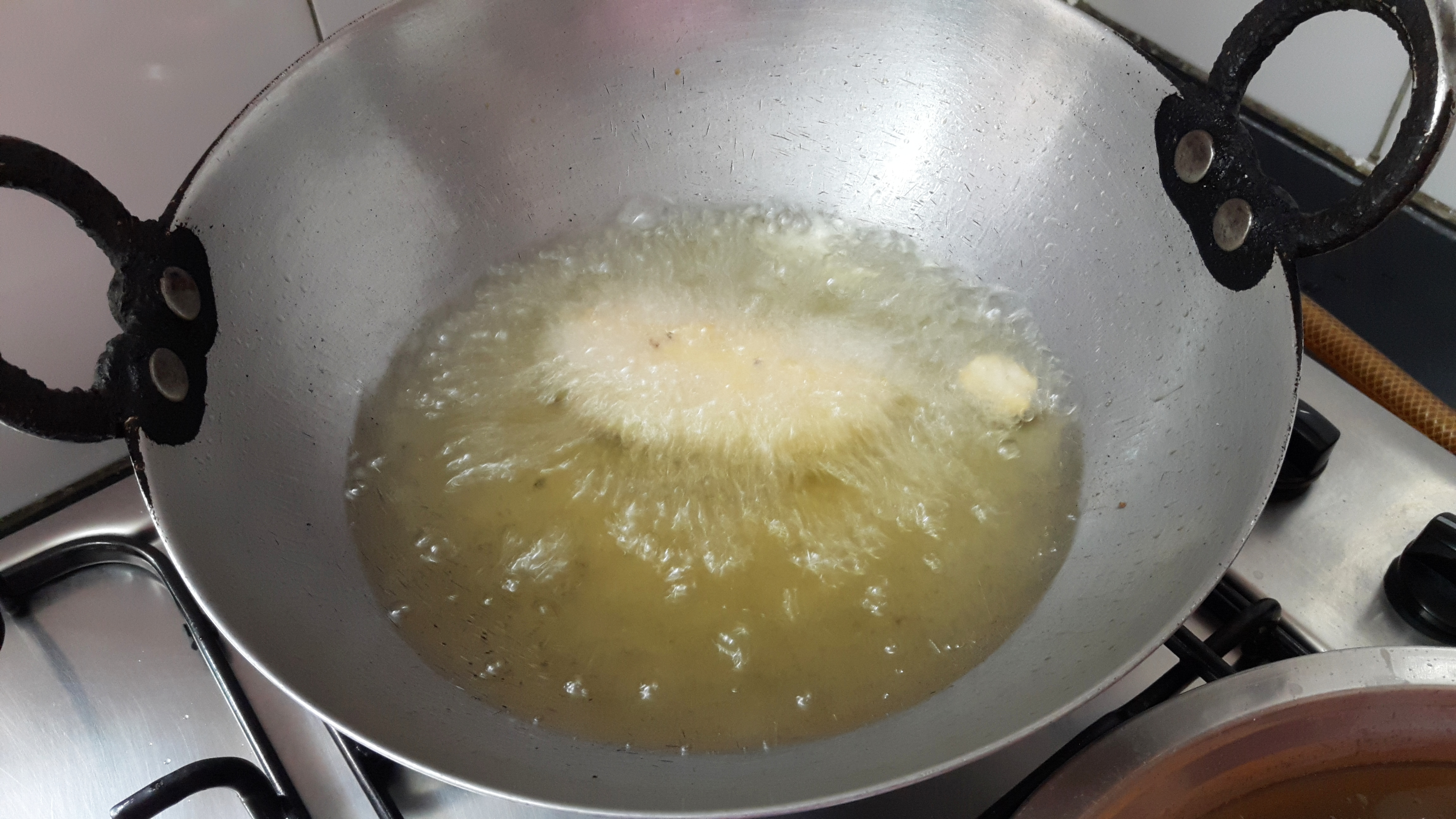 put this stuffed (vada) into hot oil