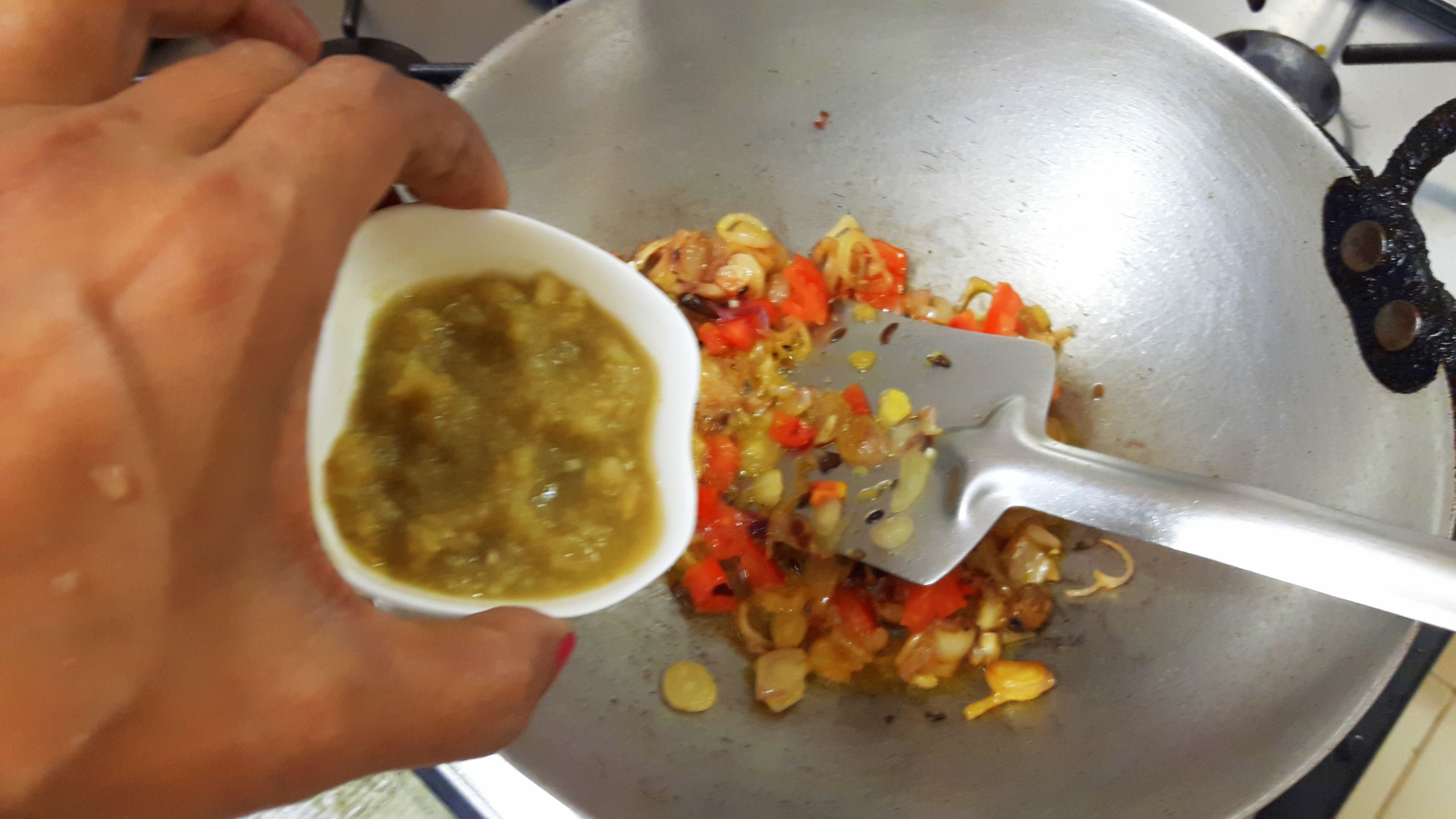 Add chopped tomato, ginger paste
