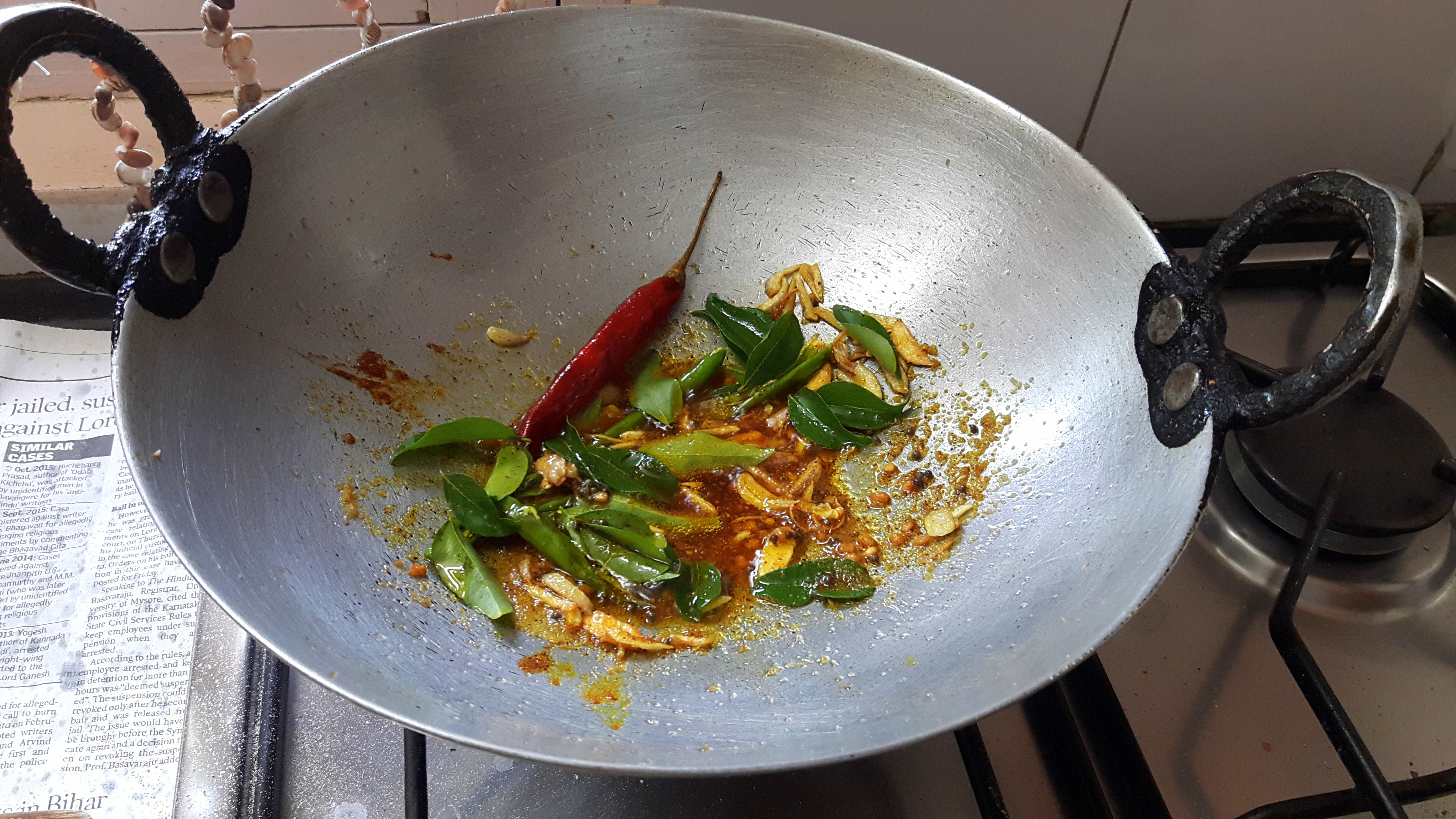 Add turmeric powder, salt and chili powder