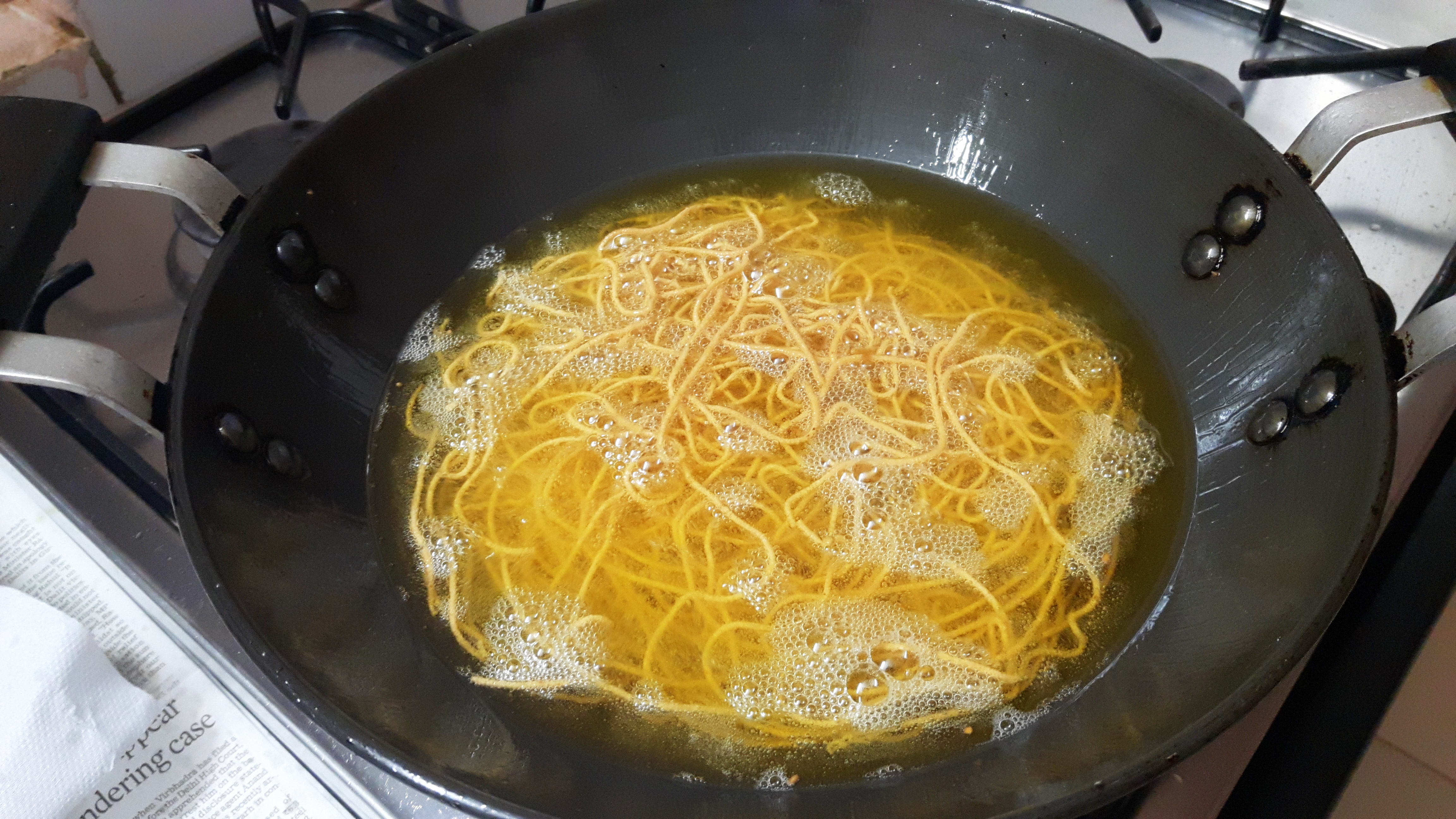 Deep fry the sev