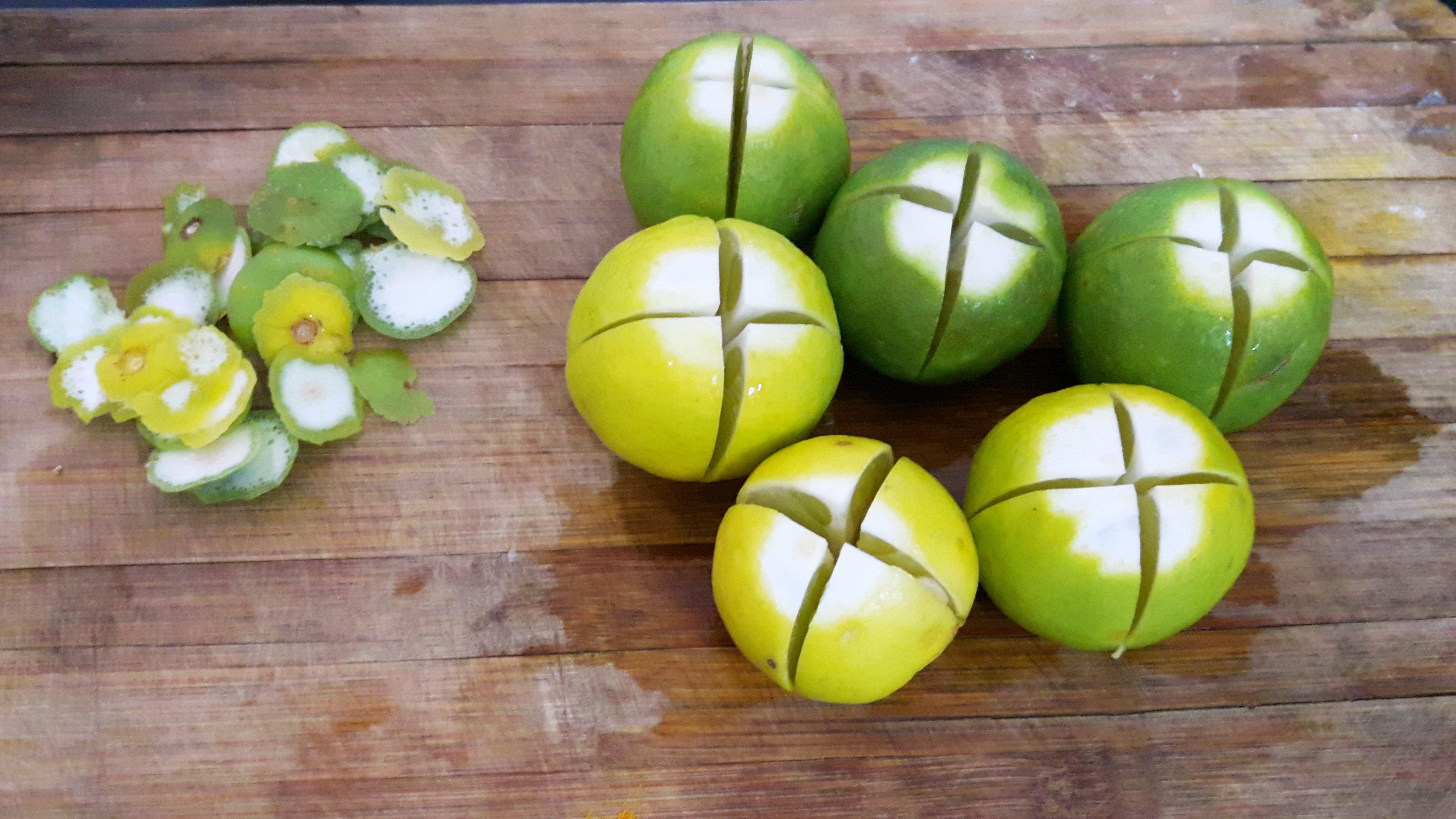 Slit the lemon into four