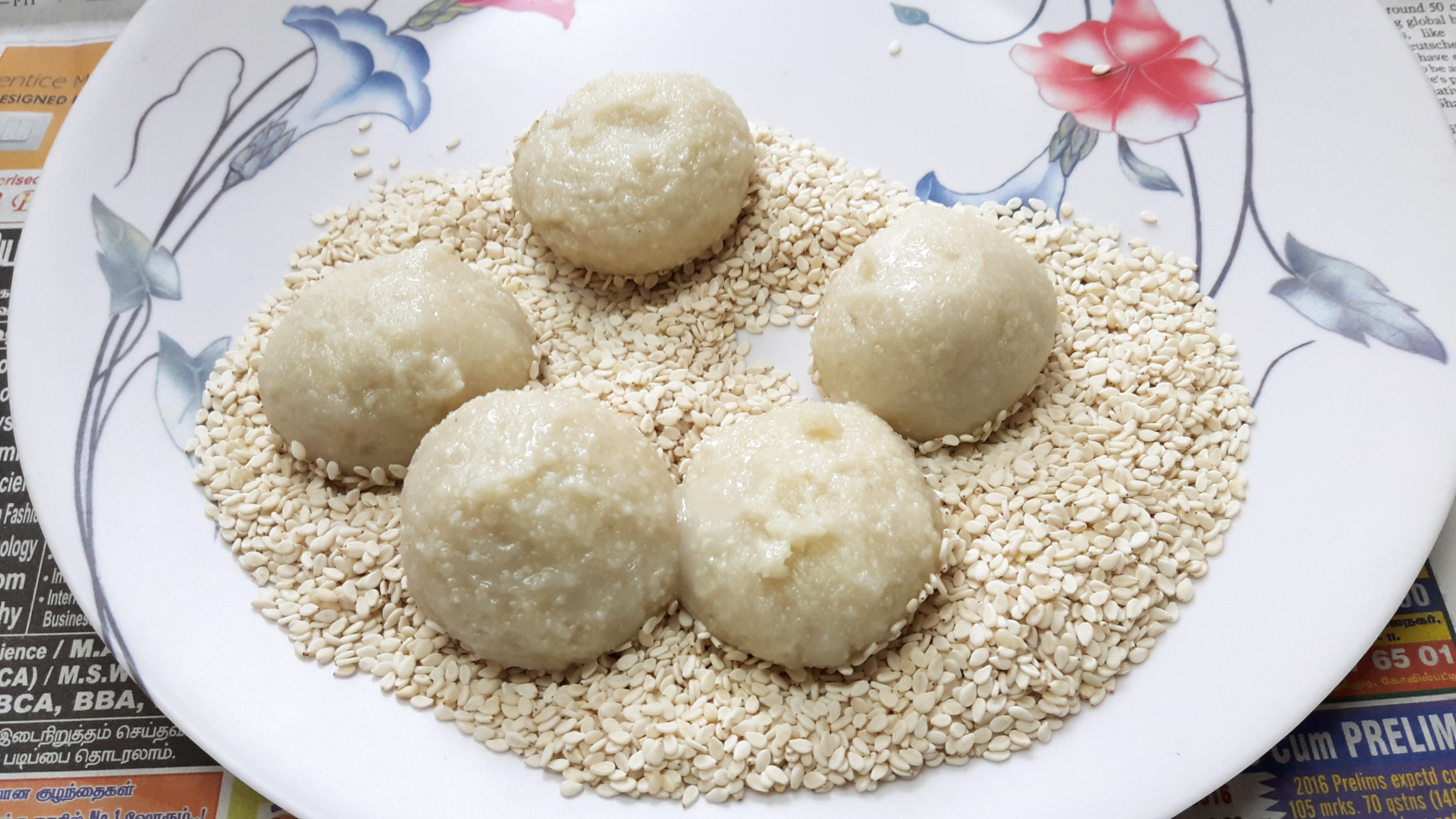 press this ball slightly on the sesame seed