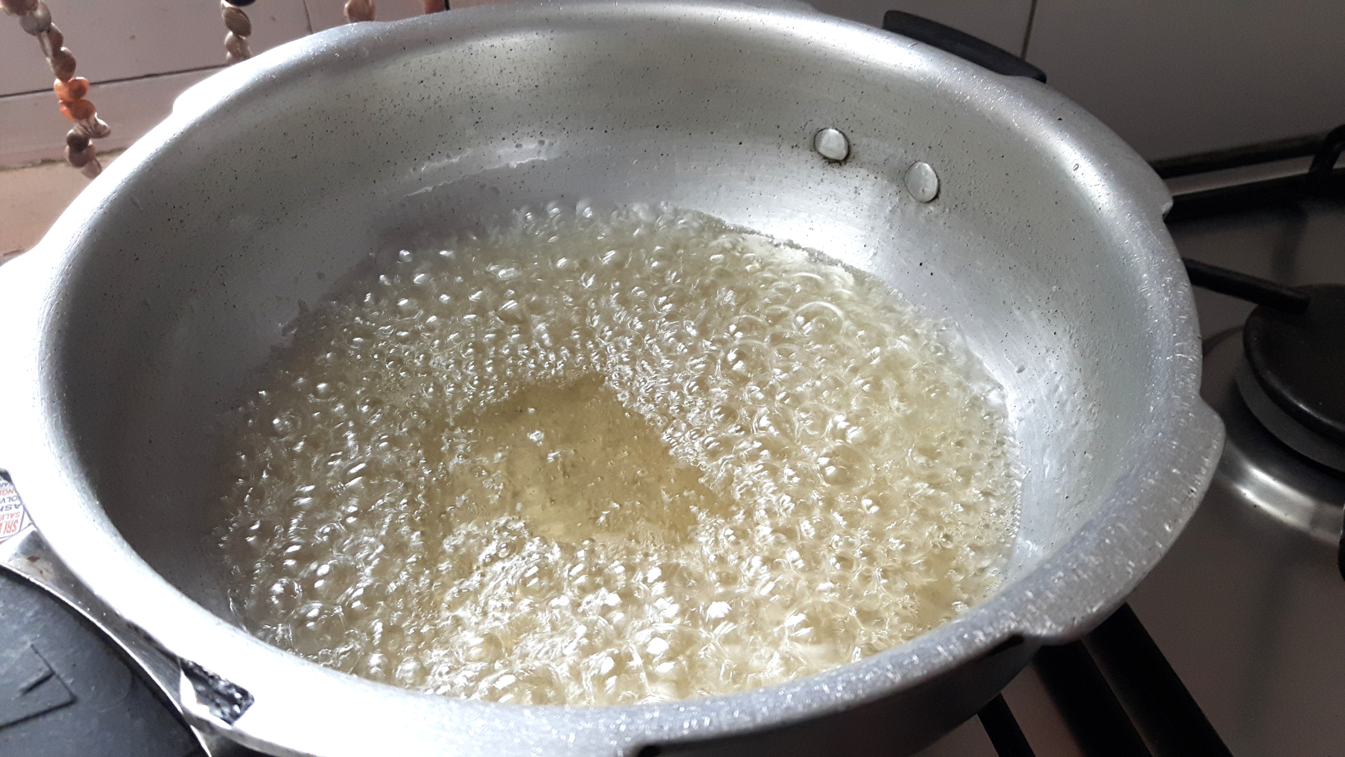 cook on high flame till one thread consistency