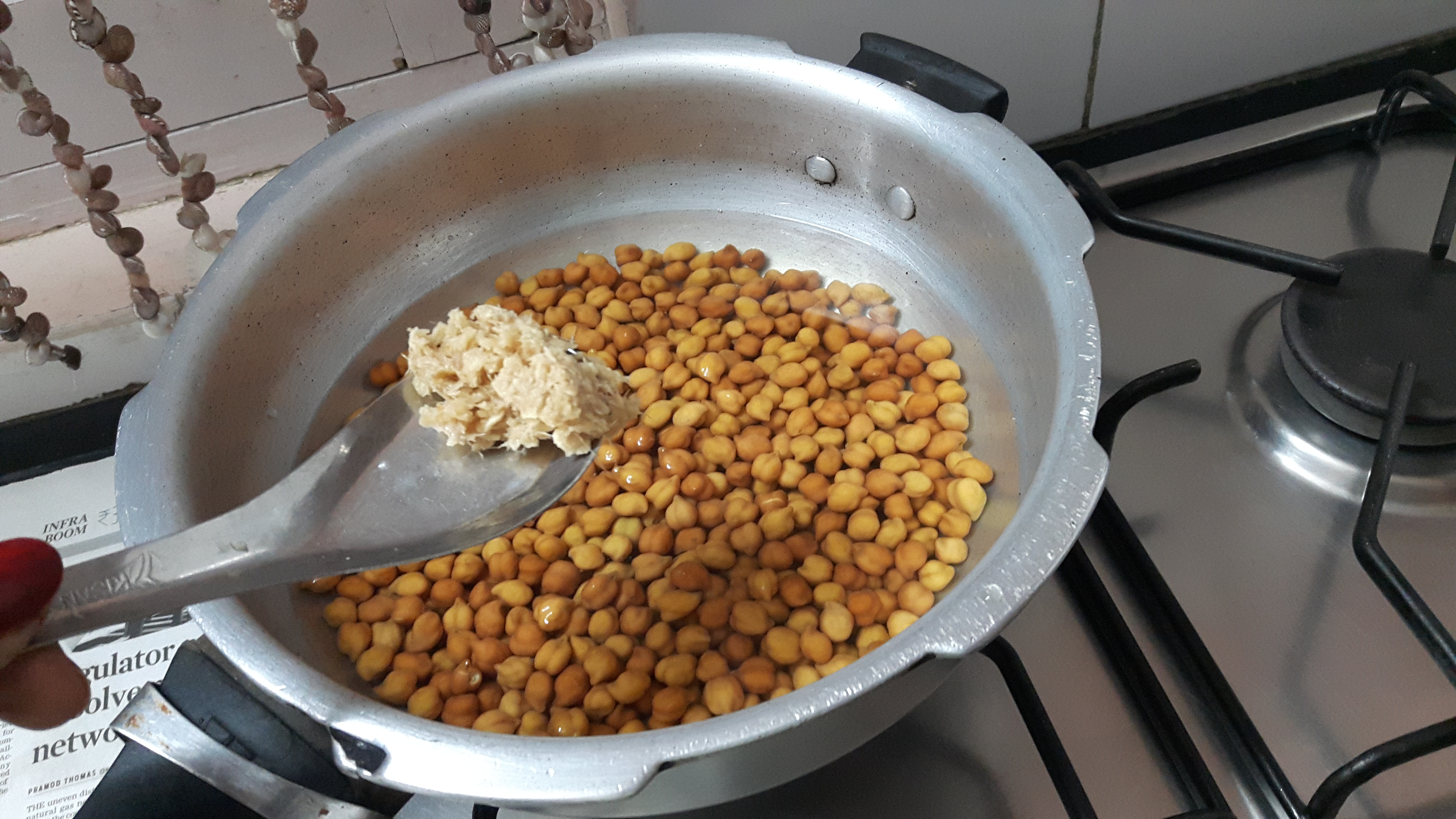 Cook kala chana along with salt and ginger paste
