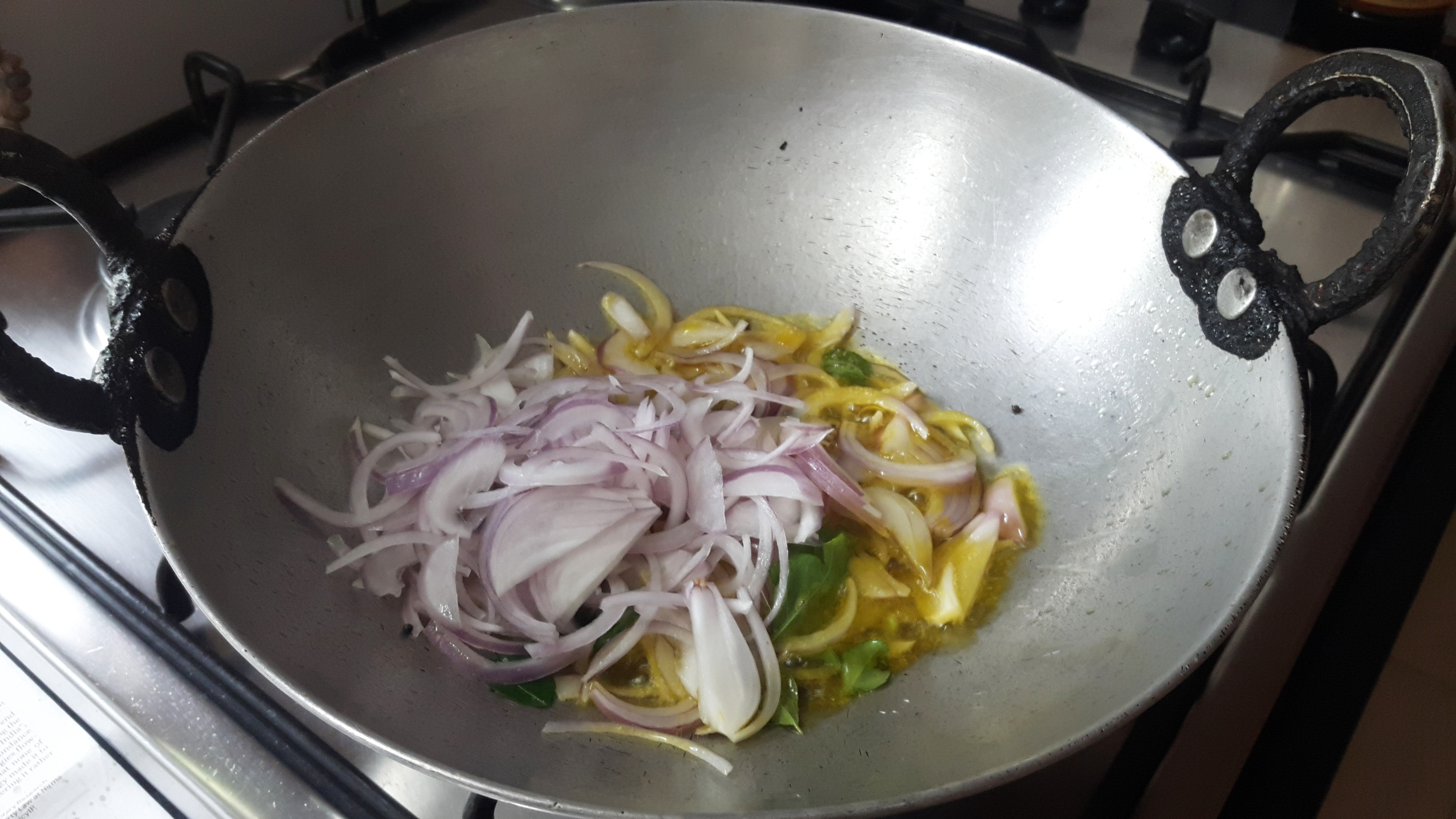 add onion and 4-5 no. of curry leaves
