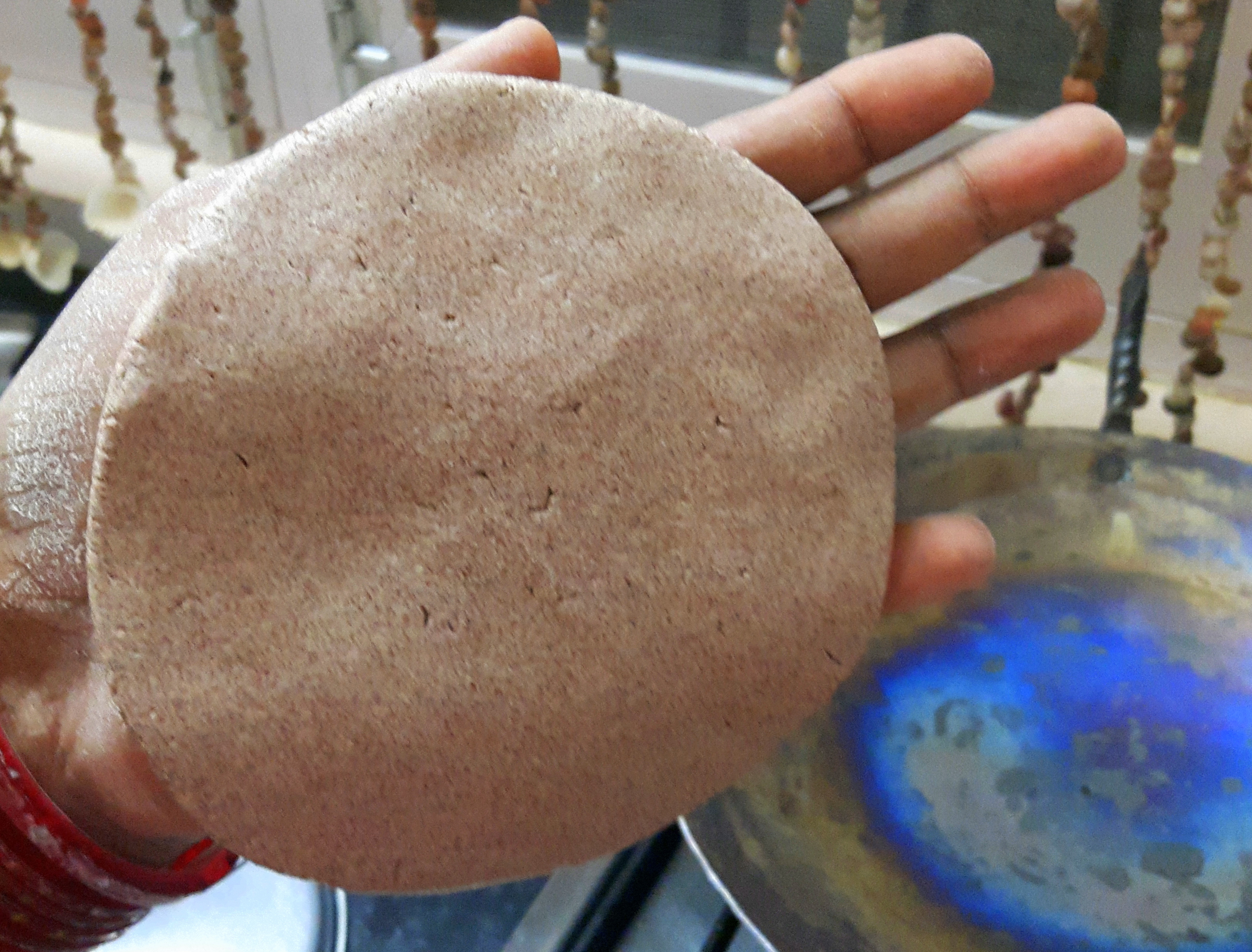 made roti with dampen palm