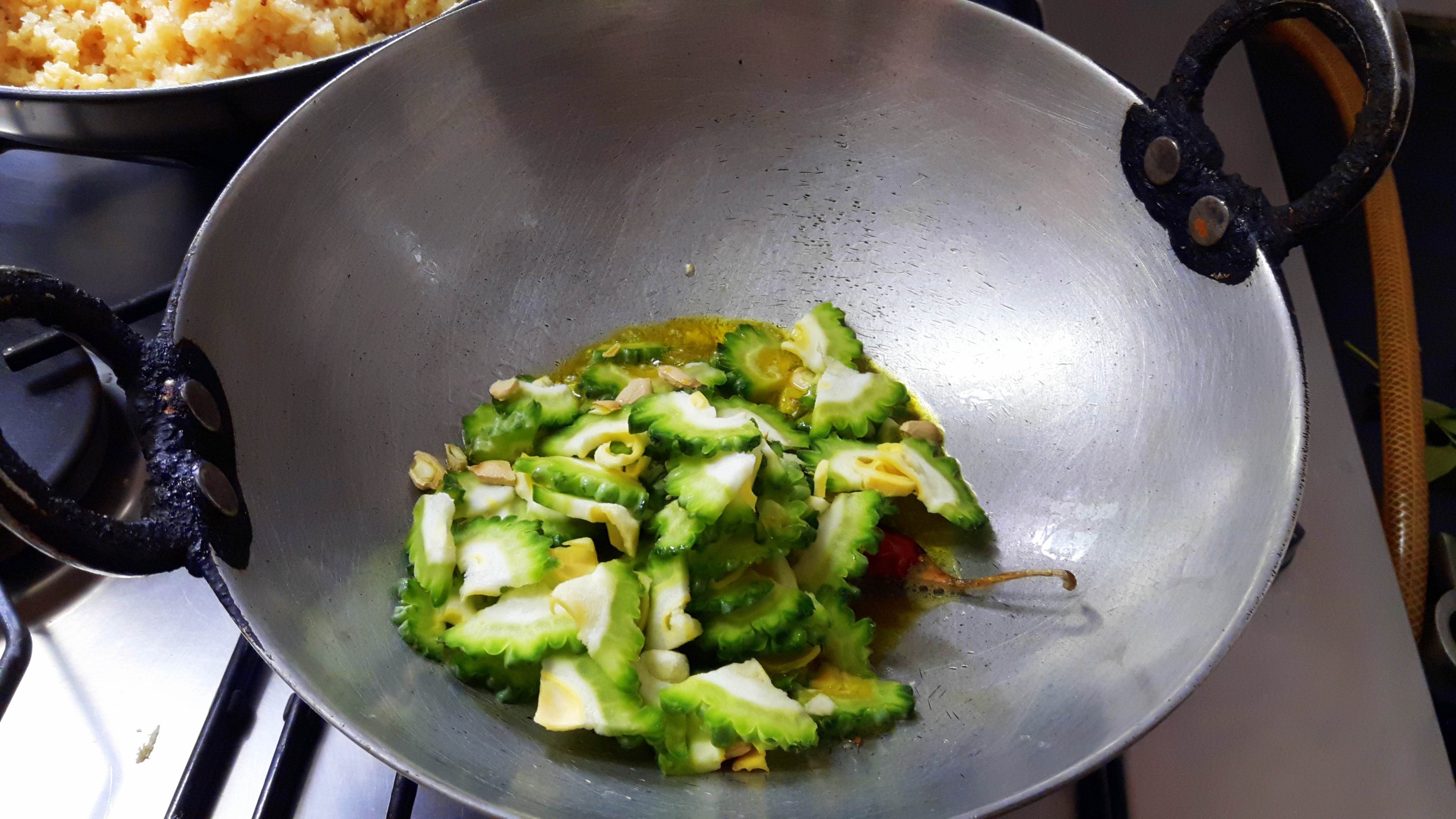 Drop chopped bitter gourd