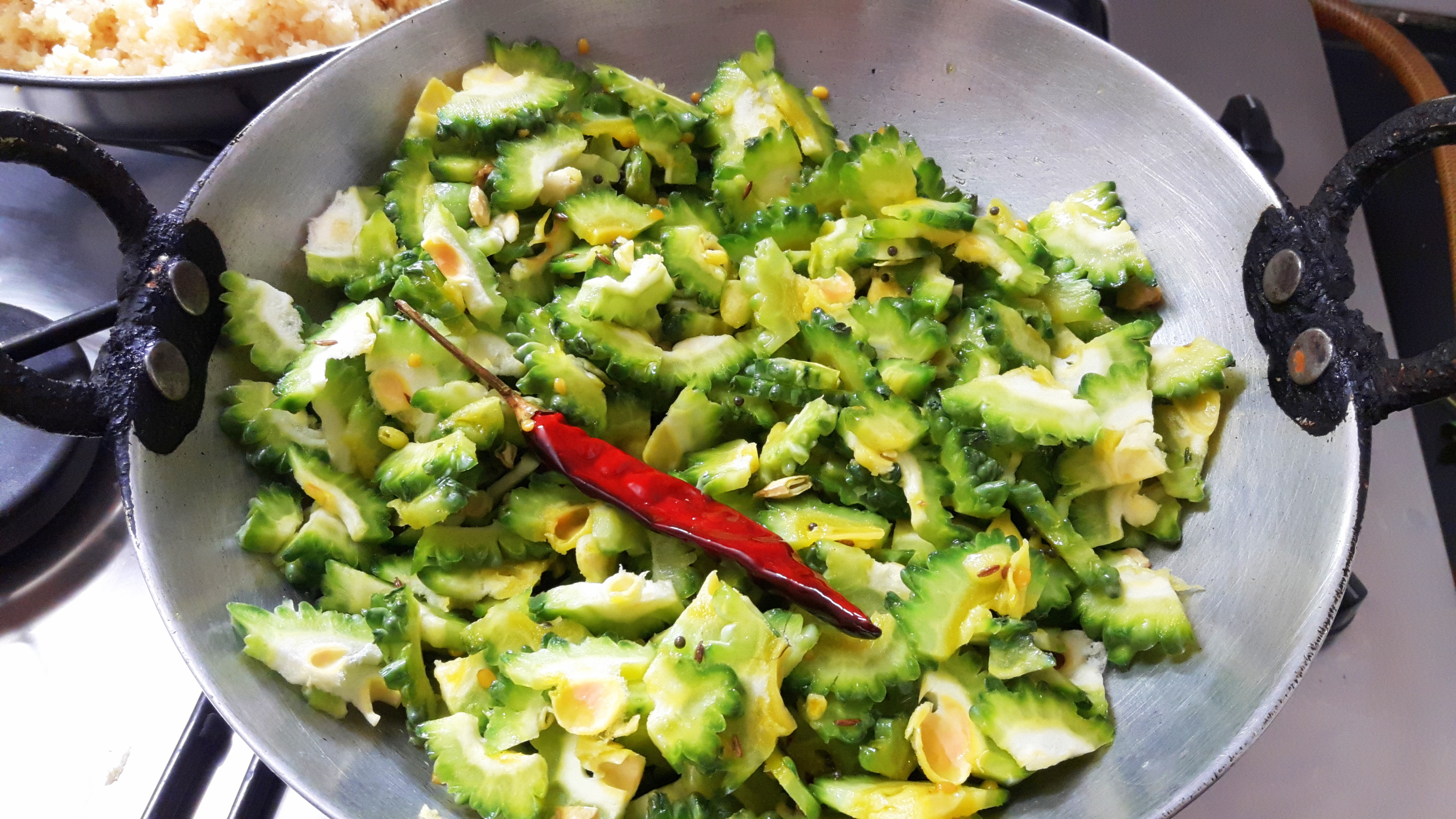 Drop chopped bitter gourd