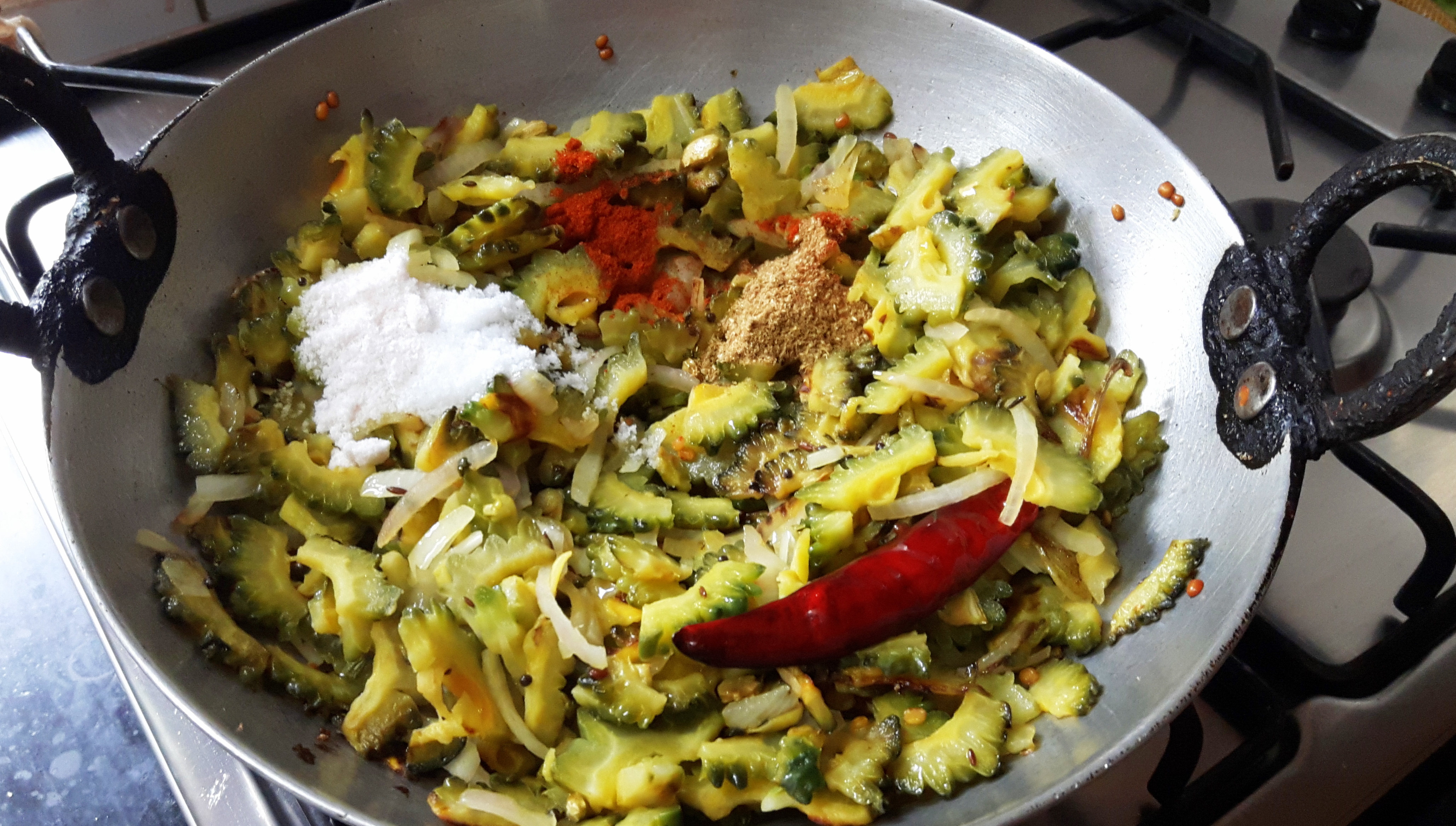 add coriander powder, turmeric powder and salt
