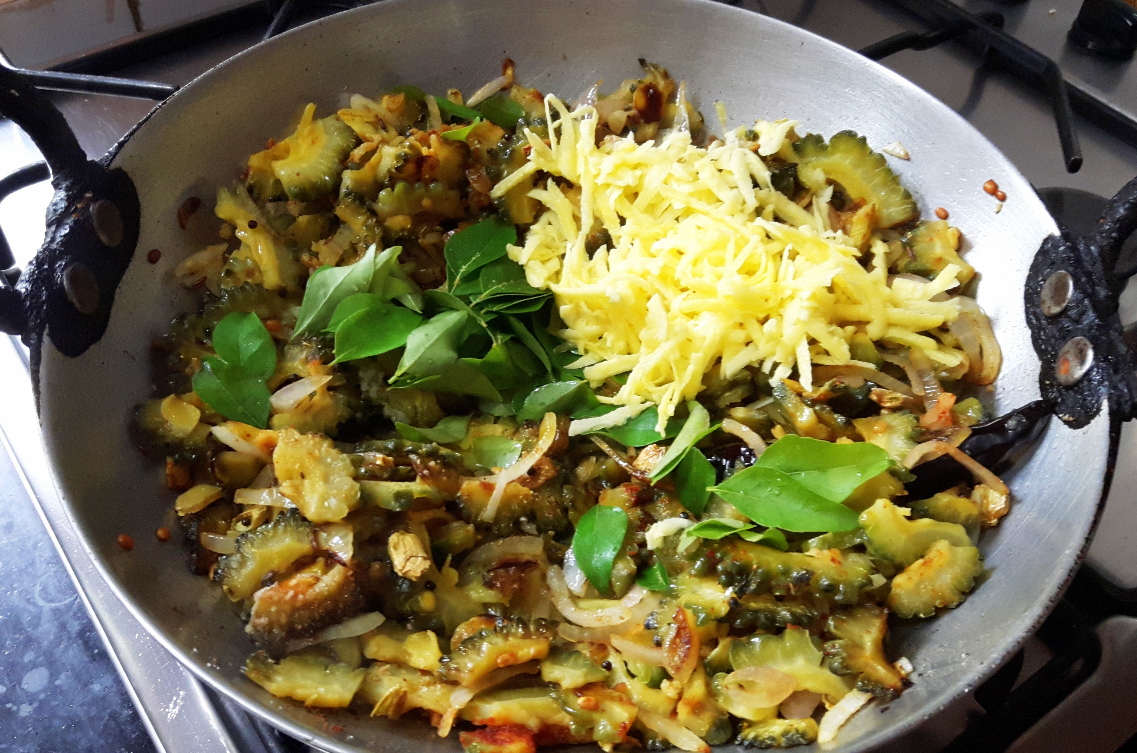 Add grated raw mango