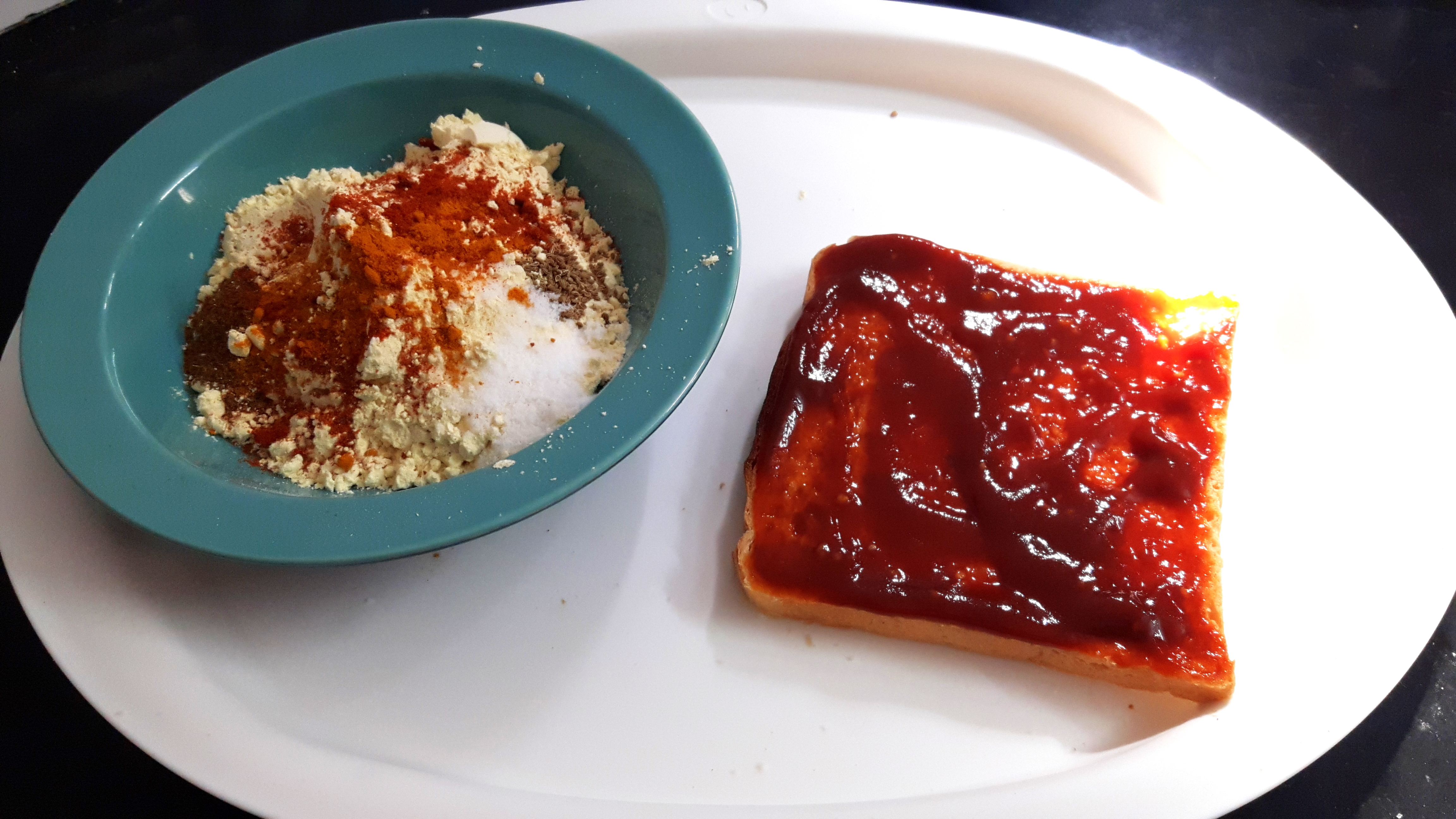 spread hot and sweet tomato ketchup