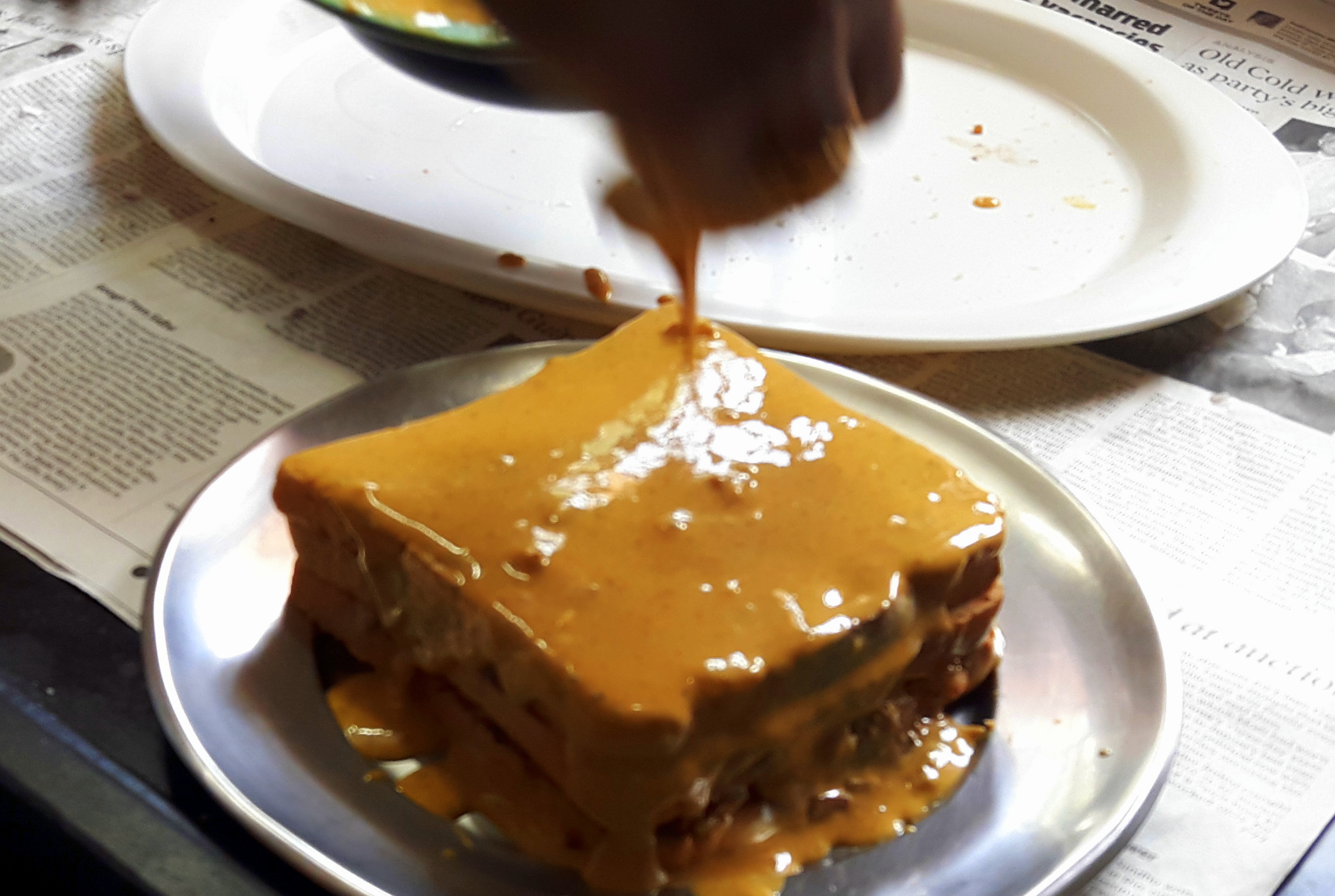 dip into Besan batter