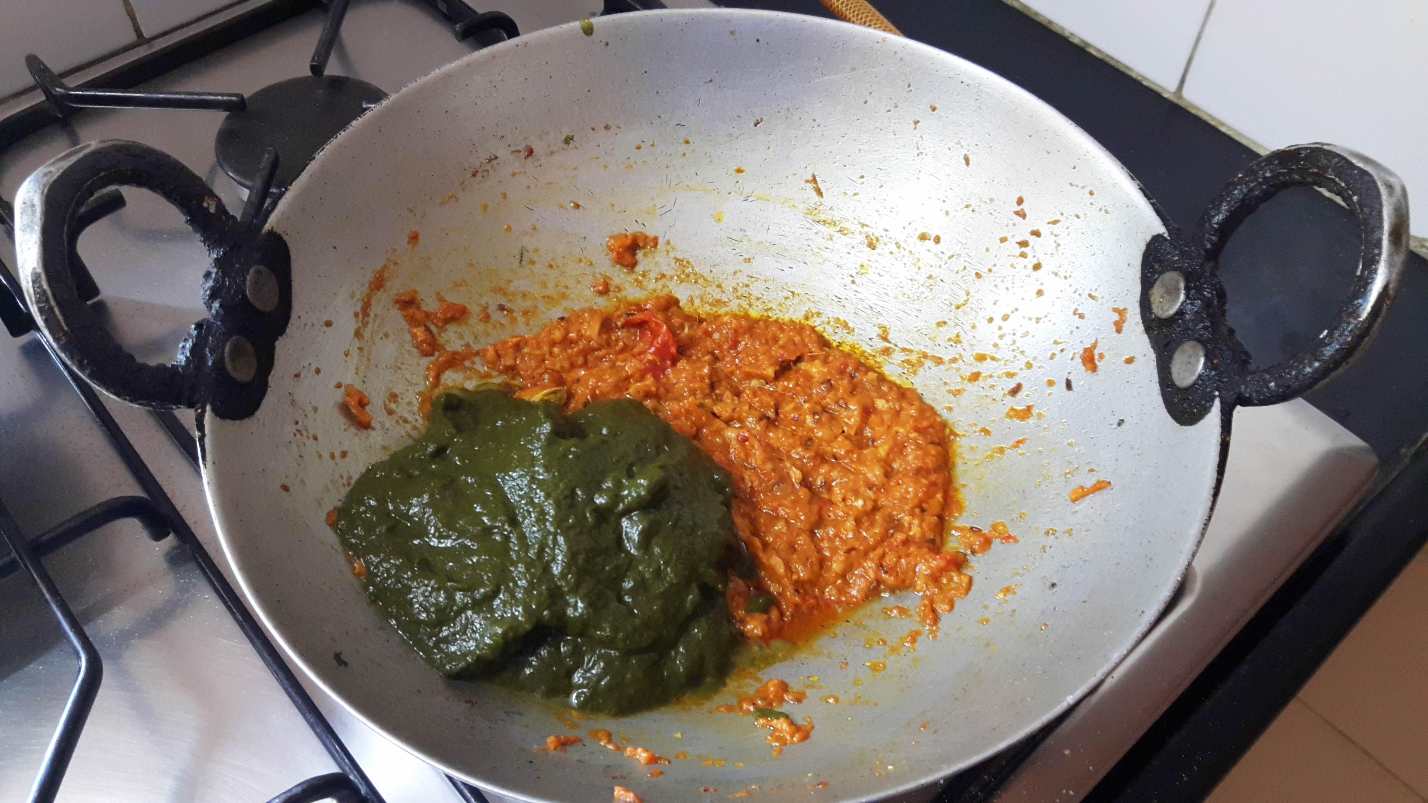 Add fresh cream and palak paste and salt