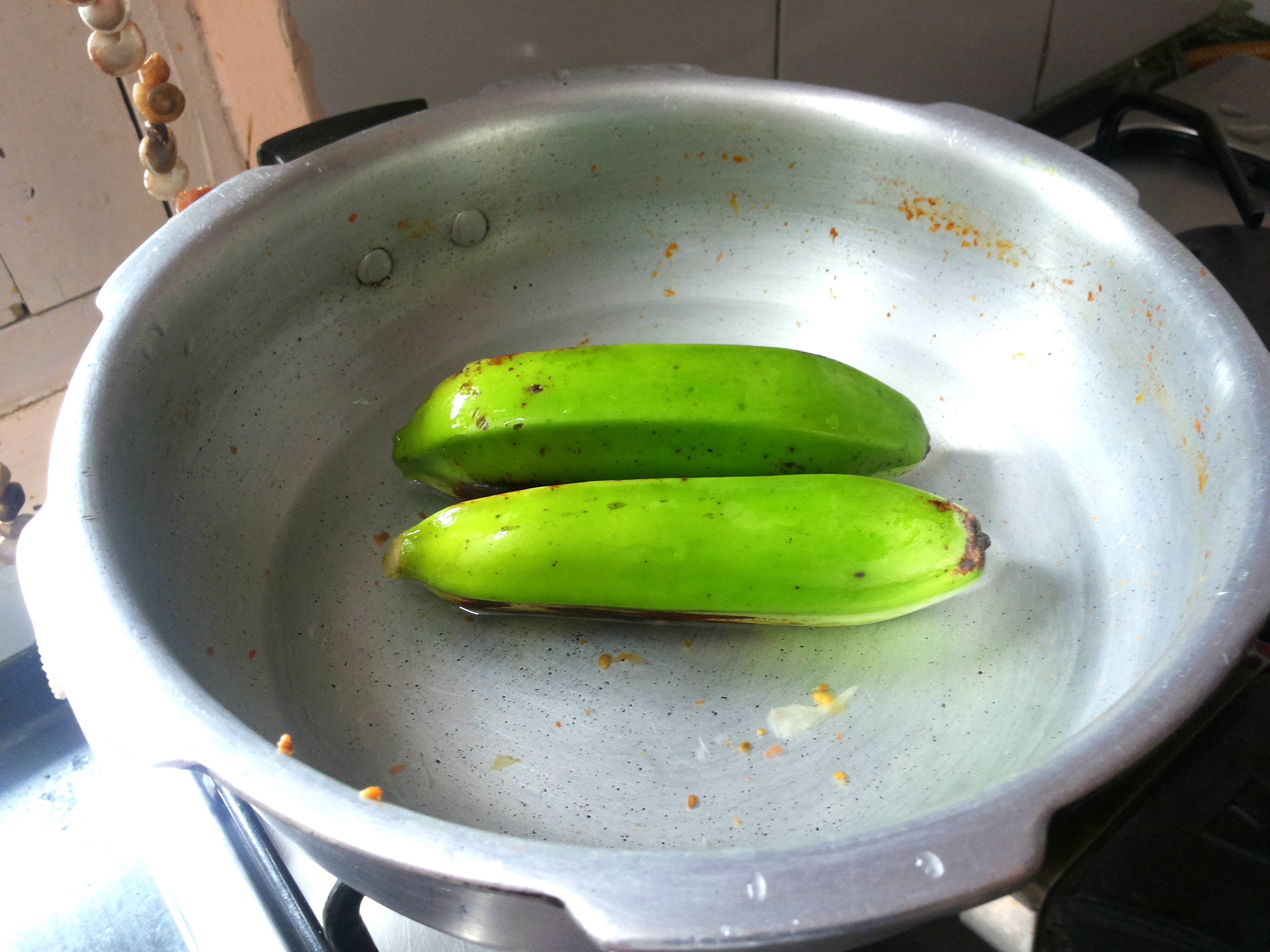 Boil/ microwave the raw banana