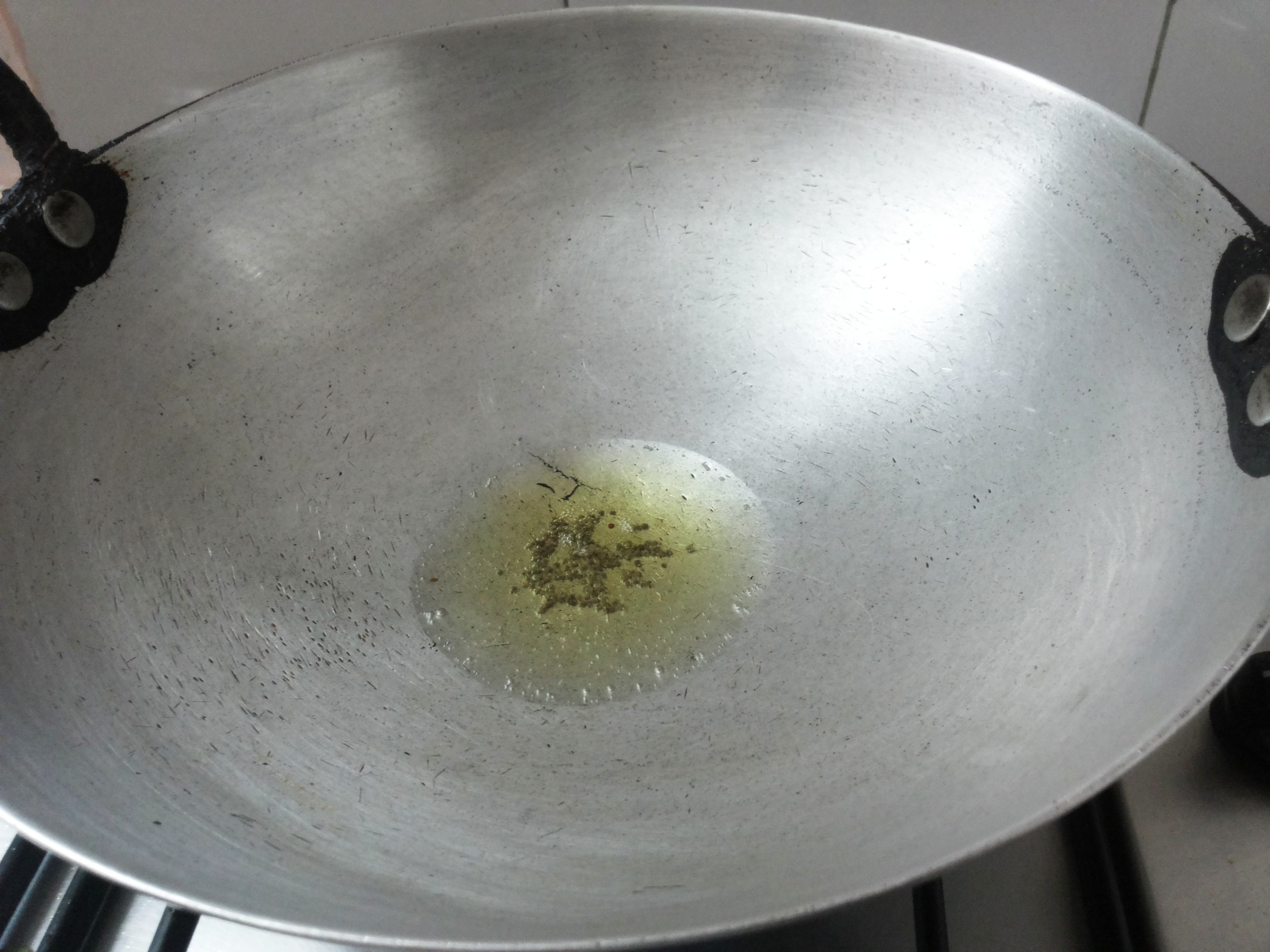 add mustard seeds