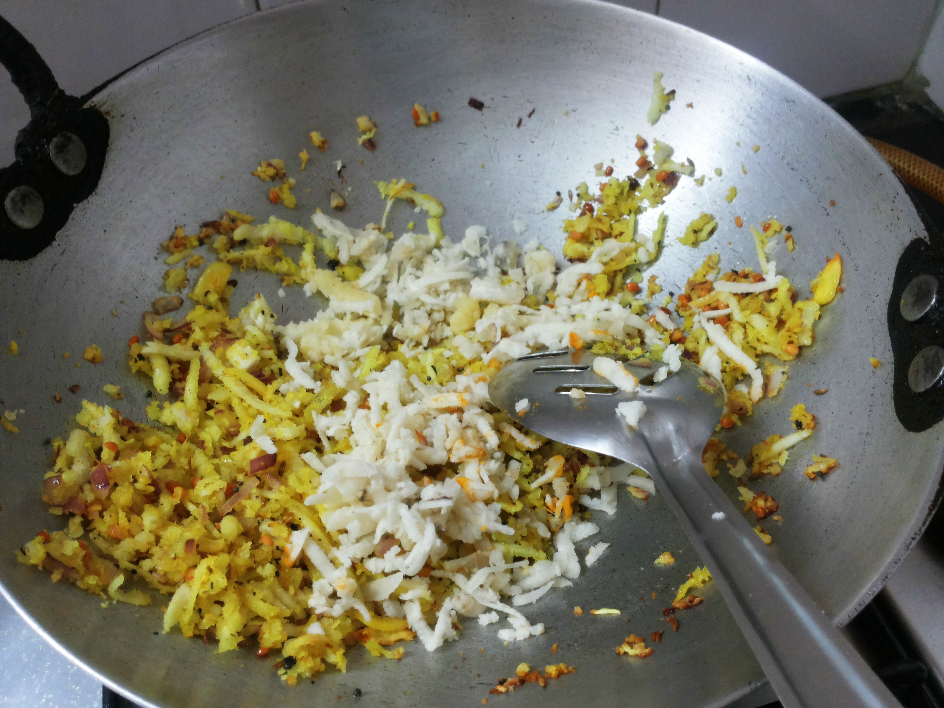 Add, grated raw banana