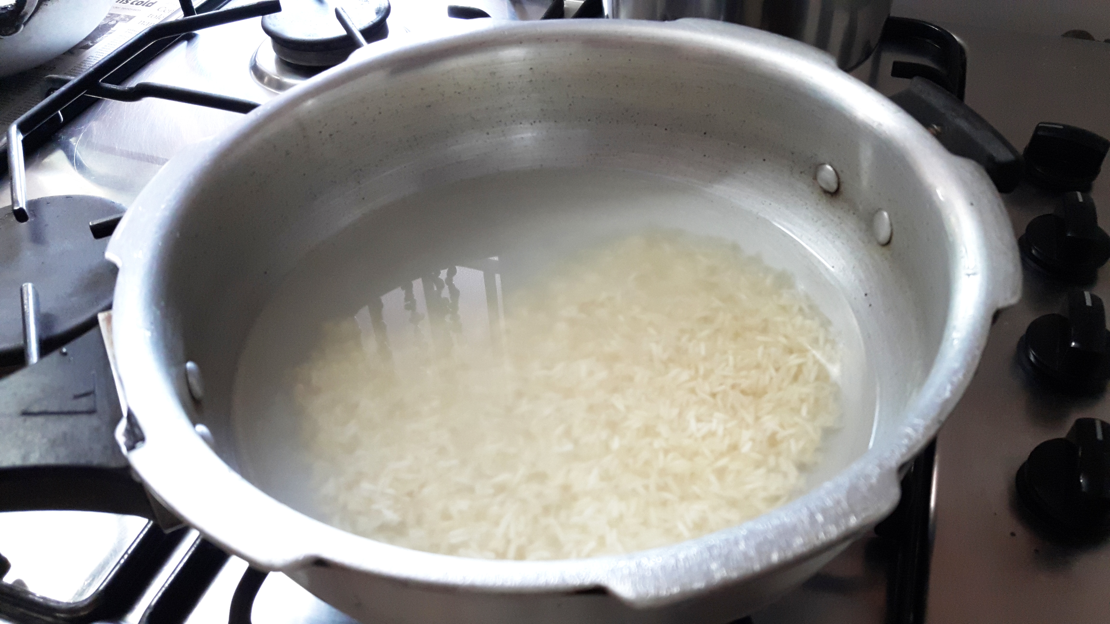 put rice into pressure cooker