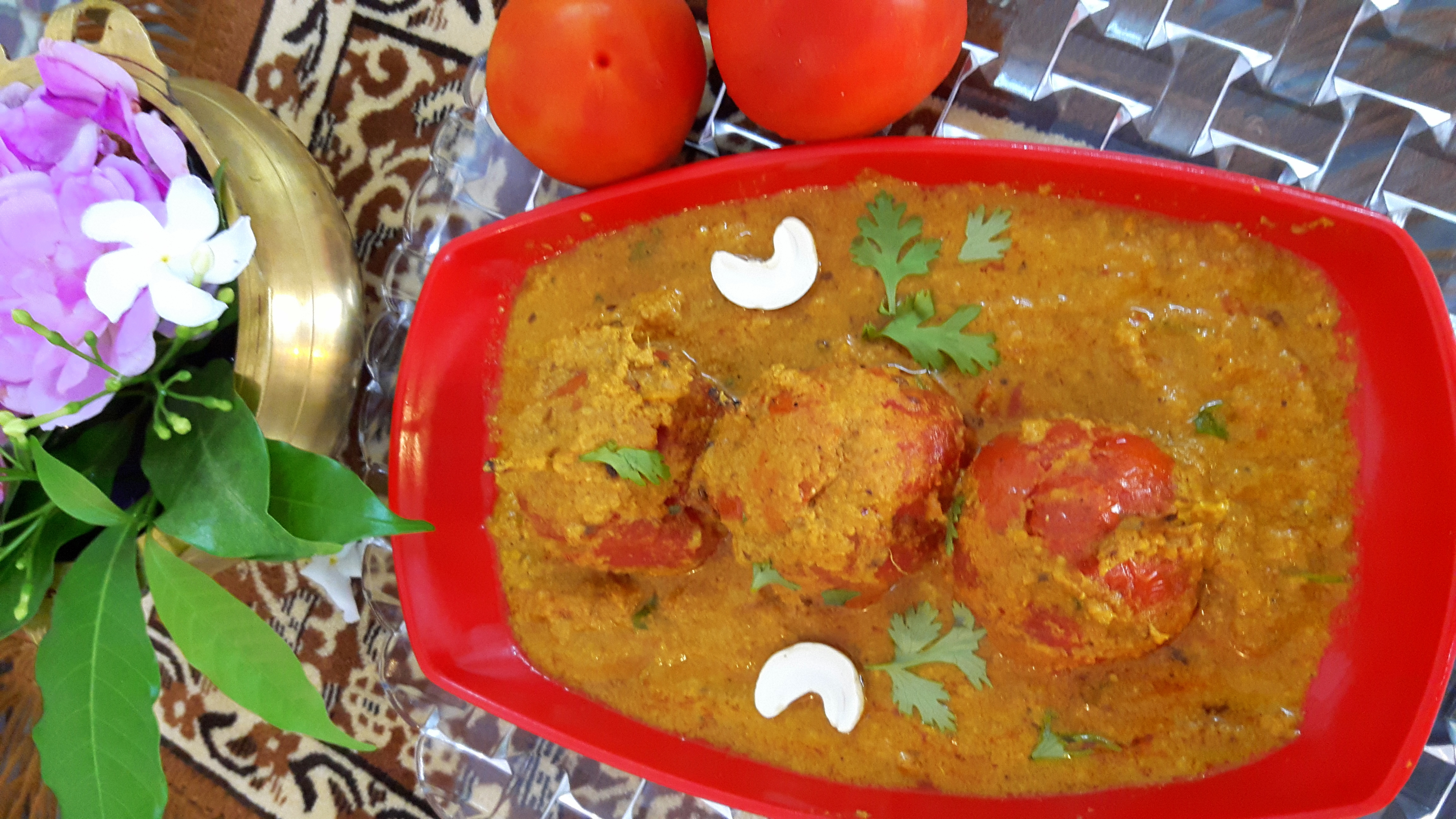 Stuff cheesy tomato in poppy curry