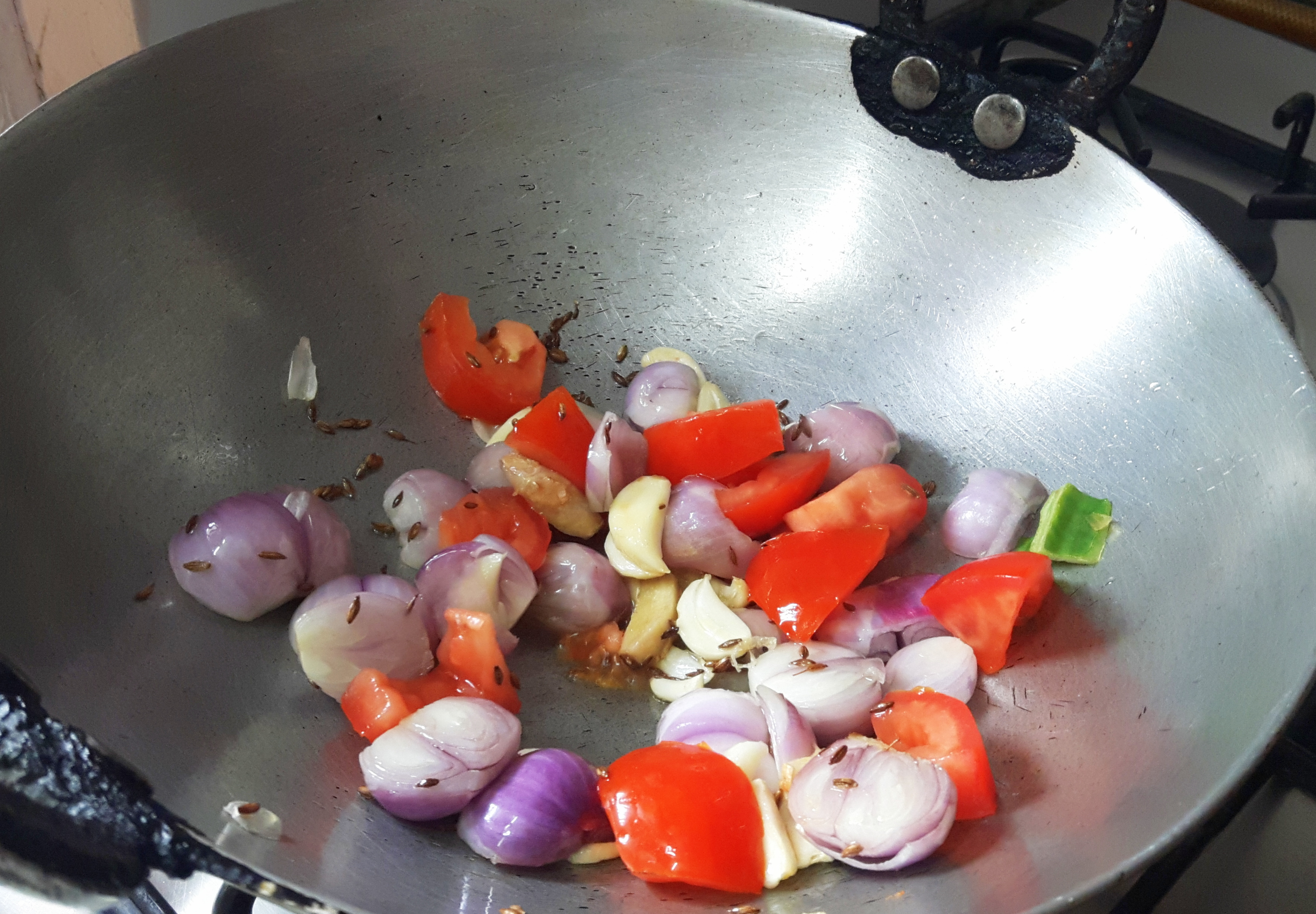 add ginger, garlic, onion, tomato