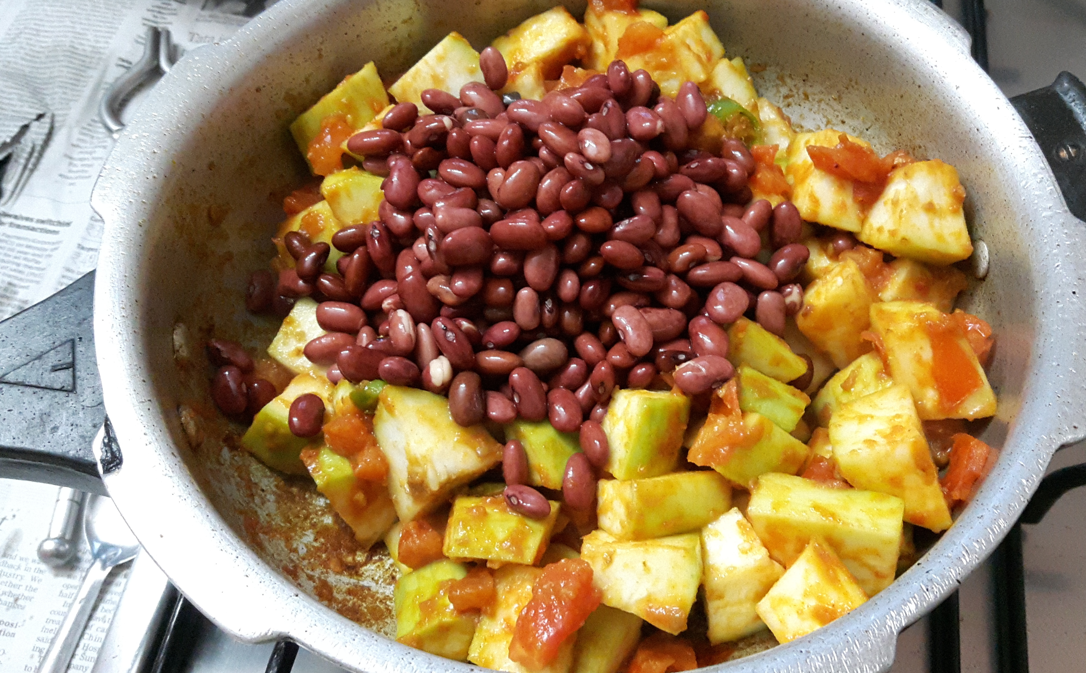Add chopped lauki and Rajma