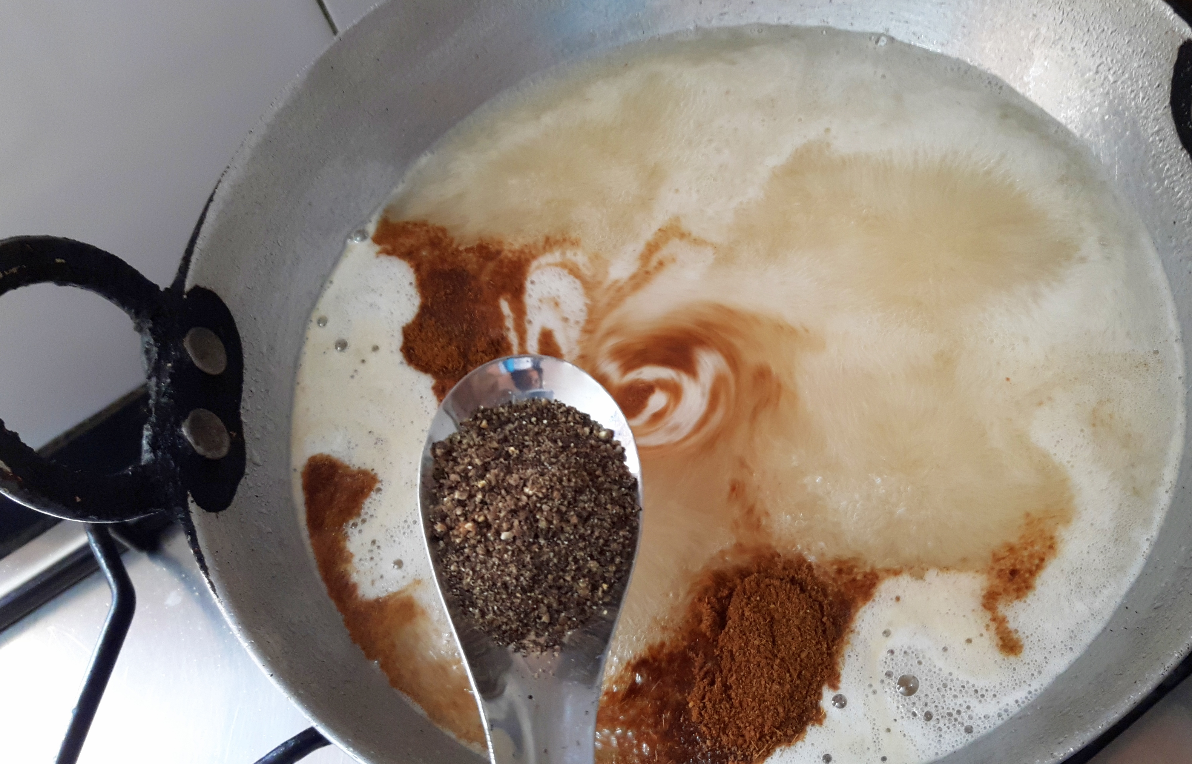 Add kala namak, cumin powder and crushed black pepper