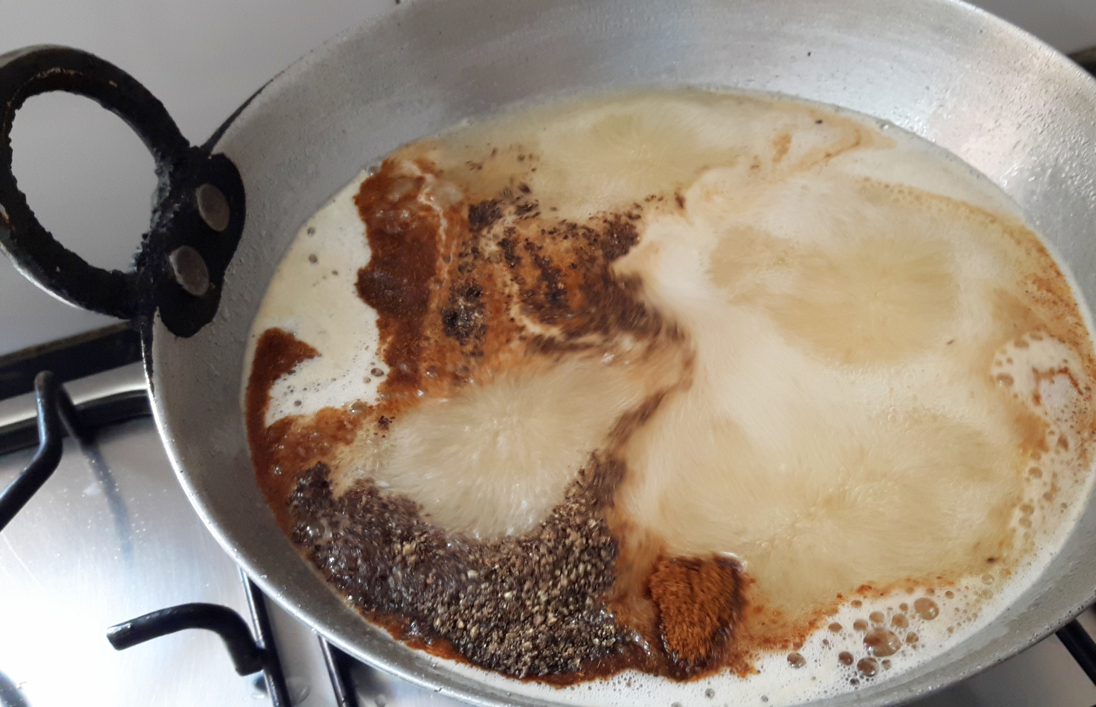 Add kala namak, cumin powder and crushed black pepper