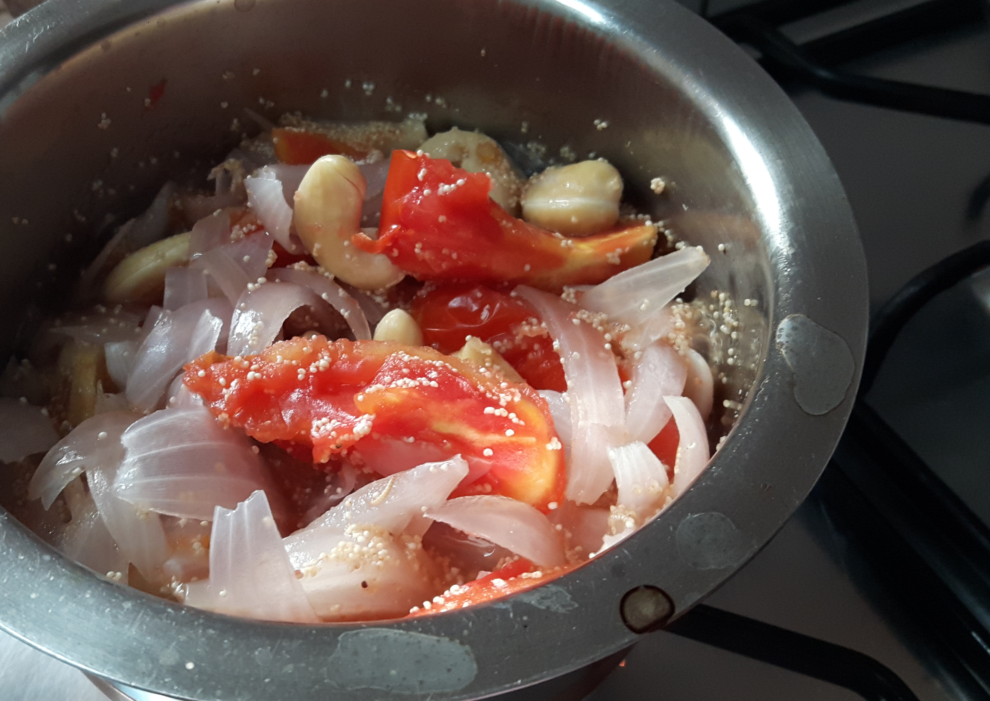 Boil chopped onion, garlic, ginger, tomato and cashew nut