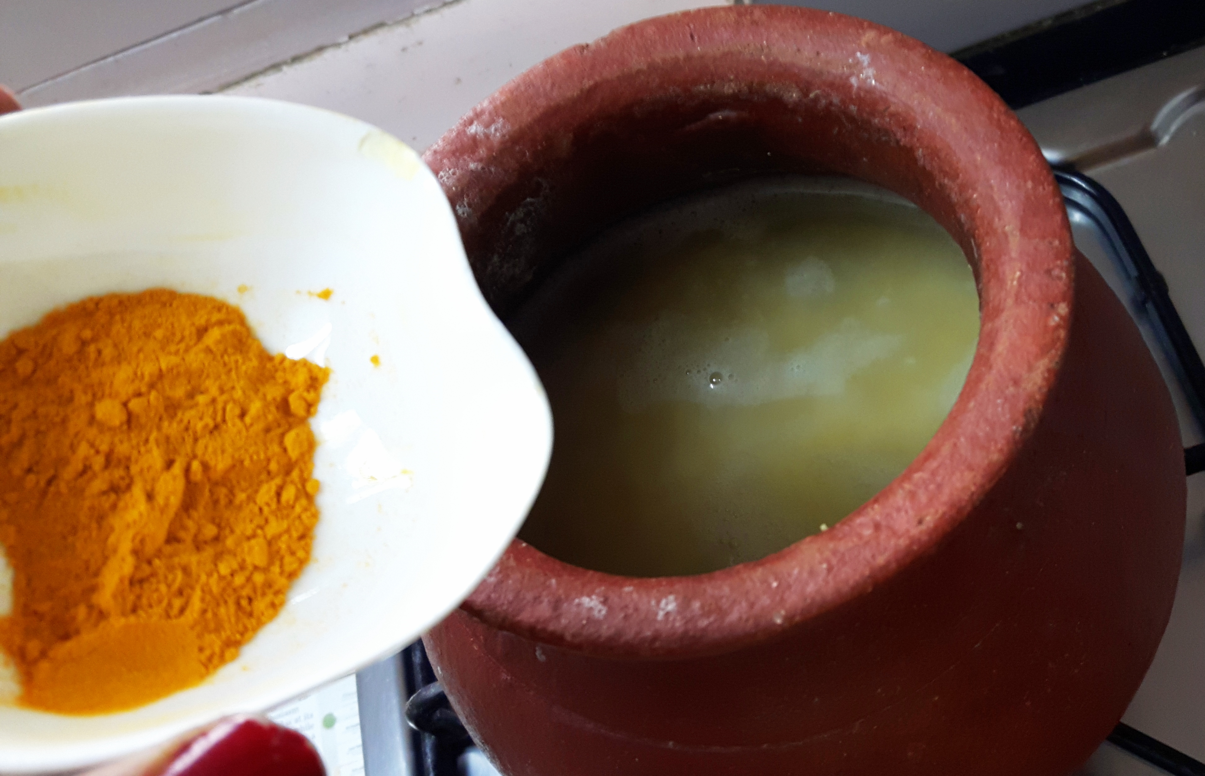 Add salt and turmeric powder