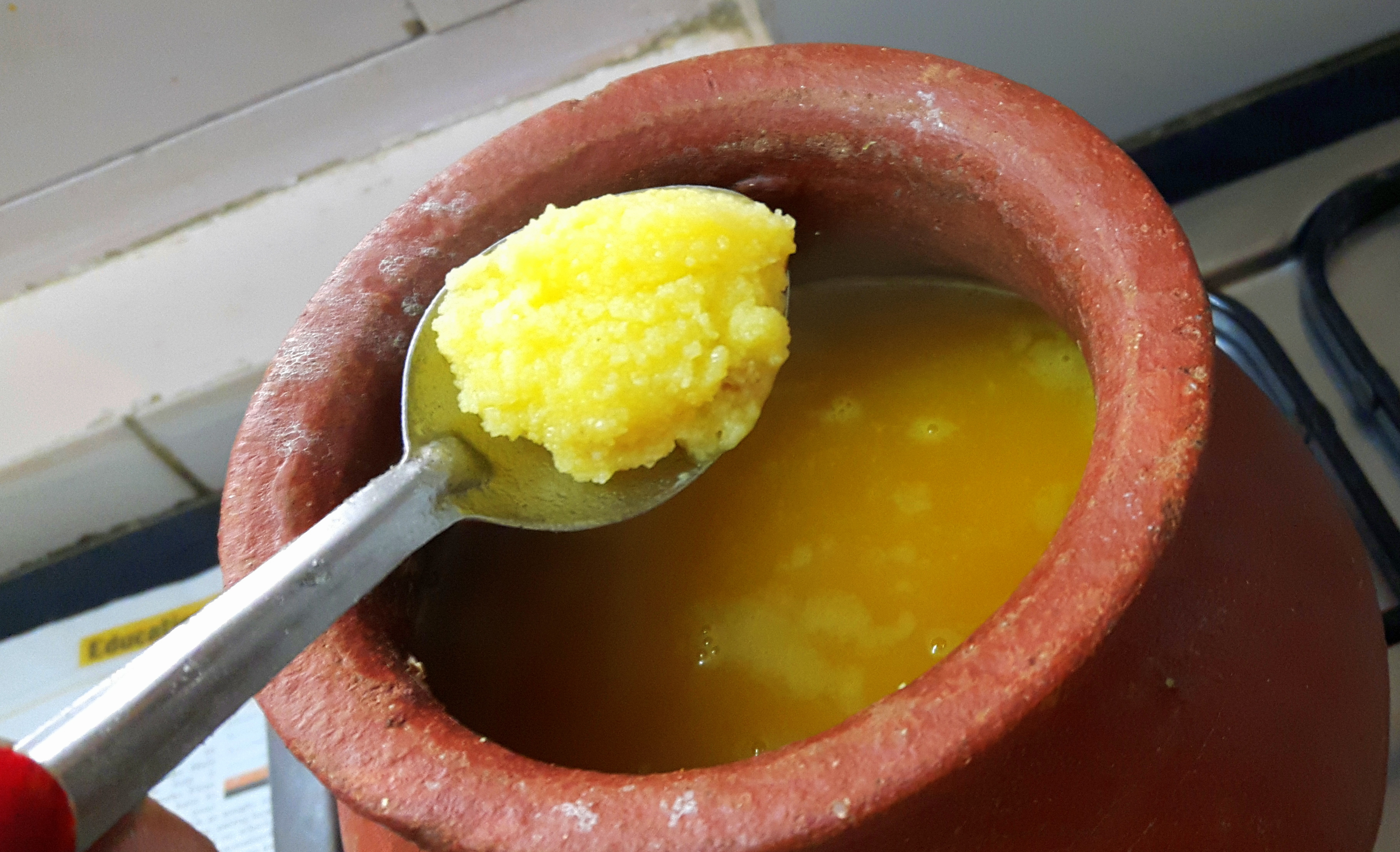 Add salt and turmeric powder along with one tablespoon of ghee