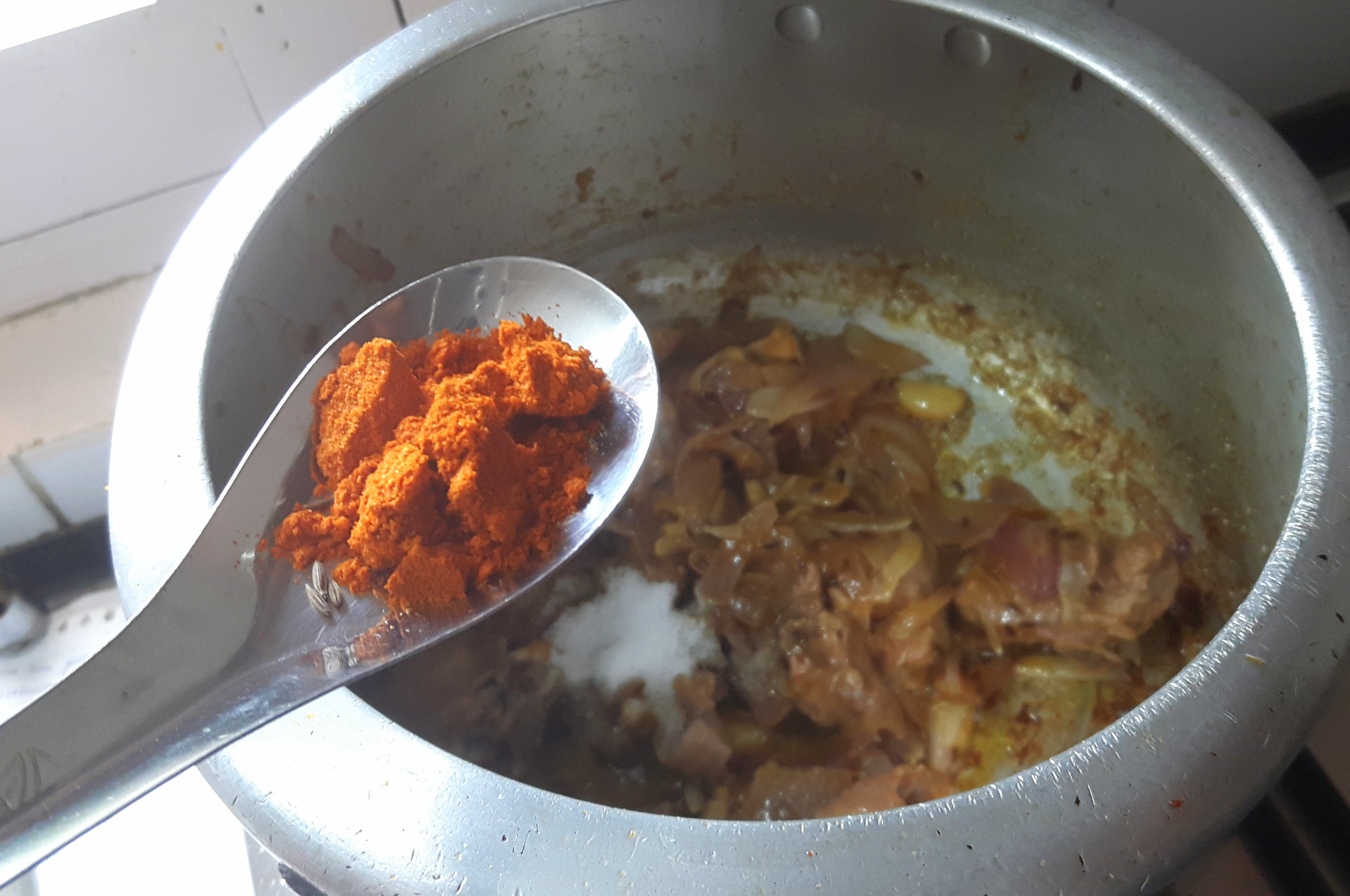 Add salt, chili powder, coriander powder, turmeric powder