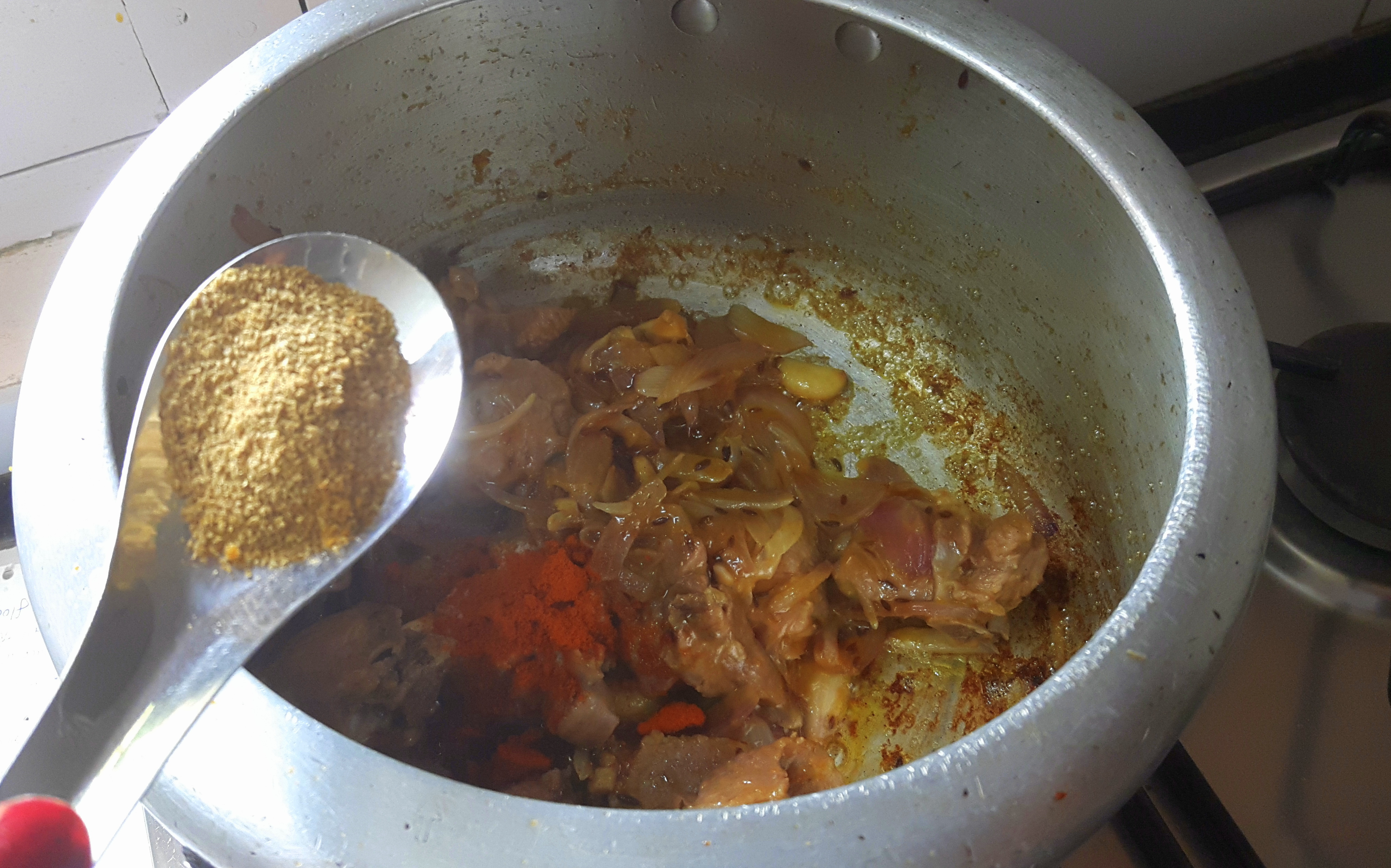 Add salt, chili powder, coriander powder, turmeric powder