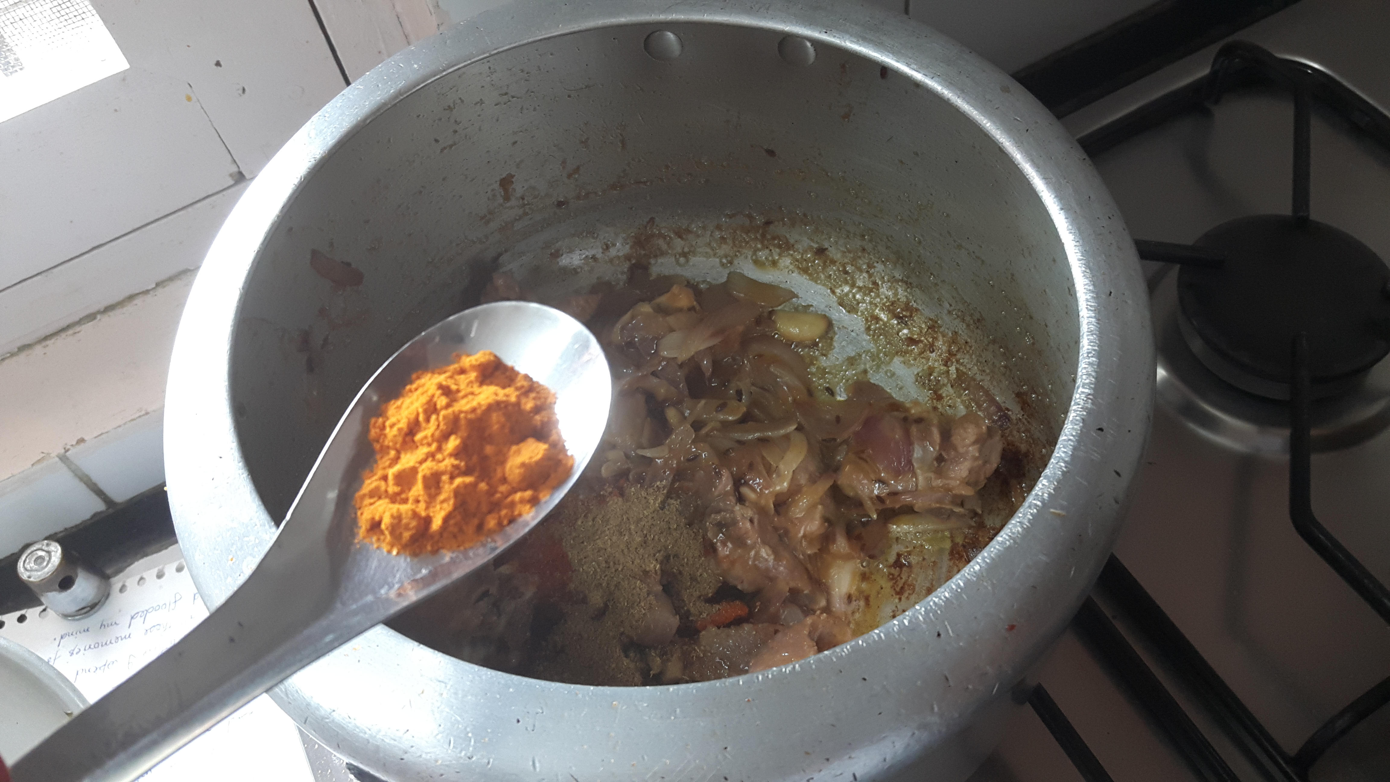 Add salt, chili powder, coriander powder, turmeric powder