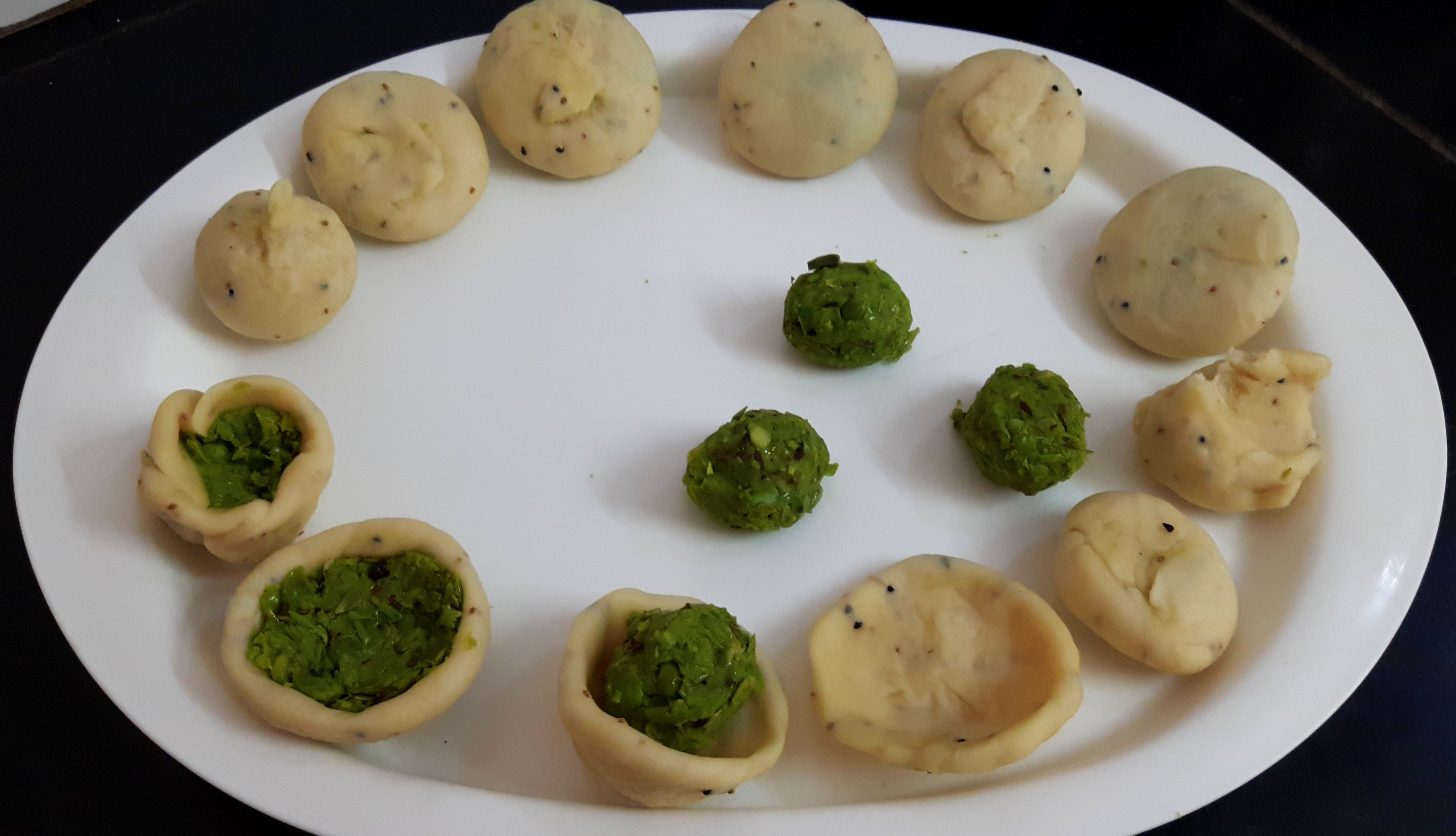 make lemon size balls. Flatten the edge of each ball with the help of finge