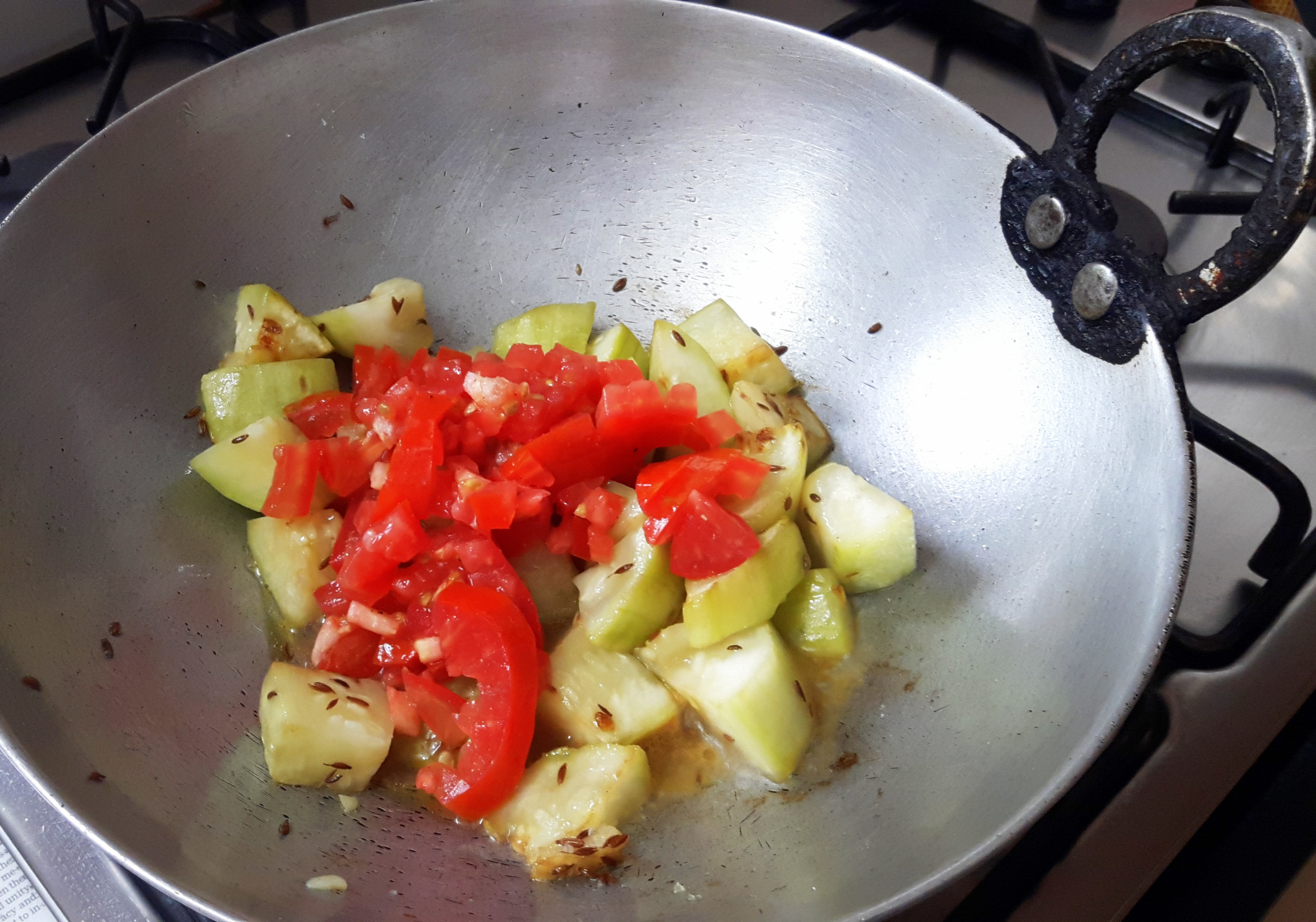 add chopped tomato