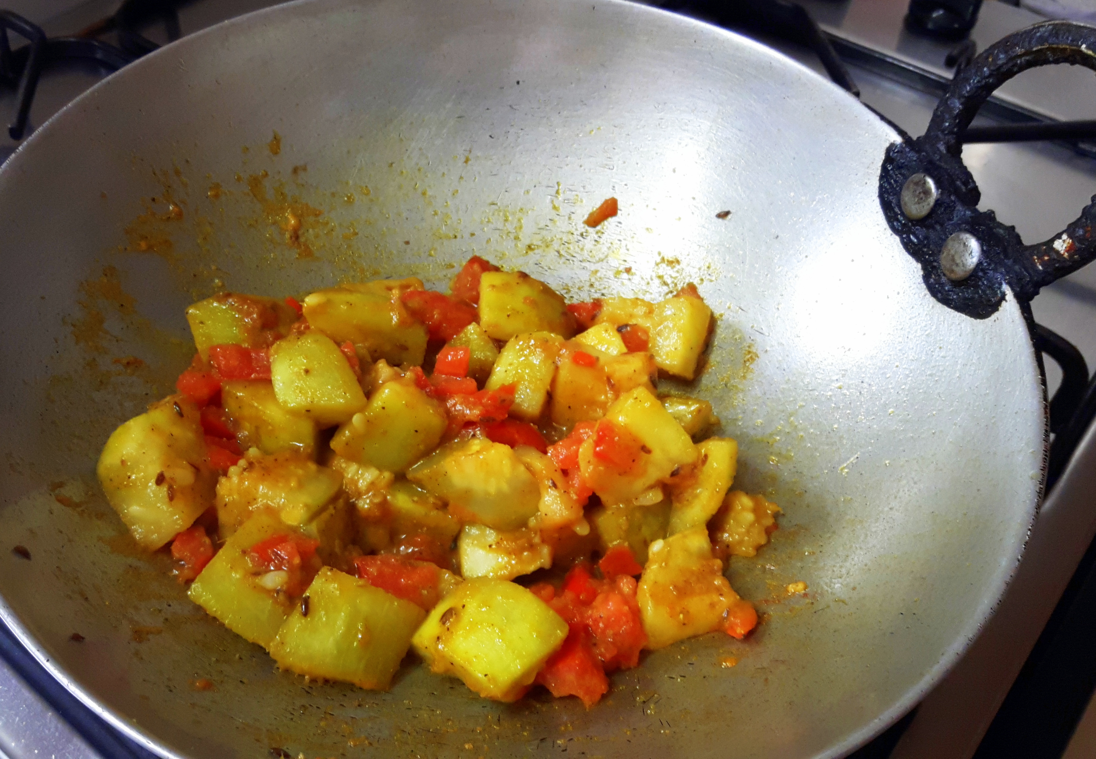 and cook on medium low flame till lauki is 90% done.