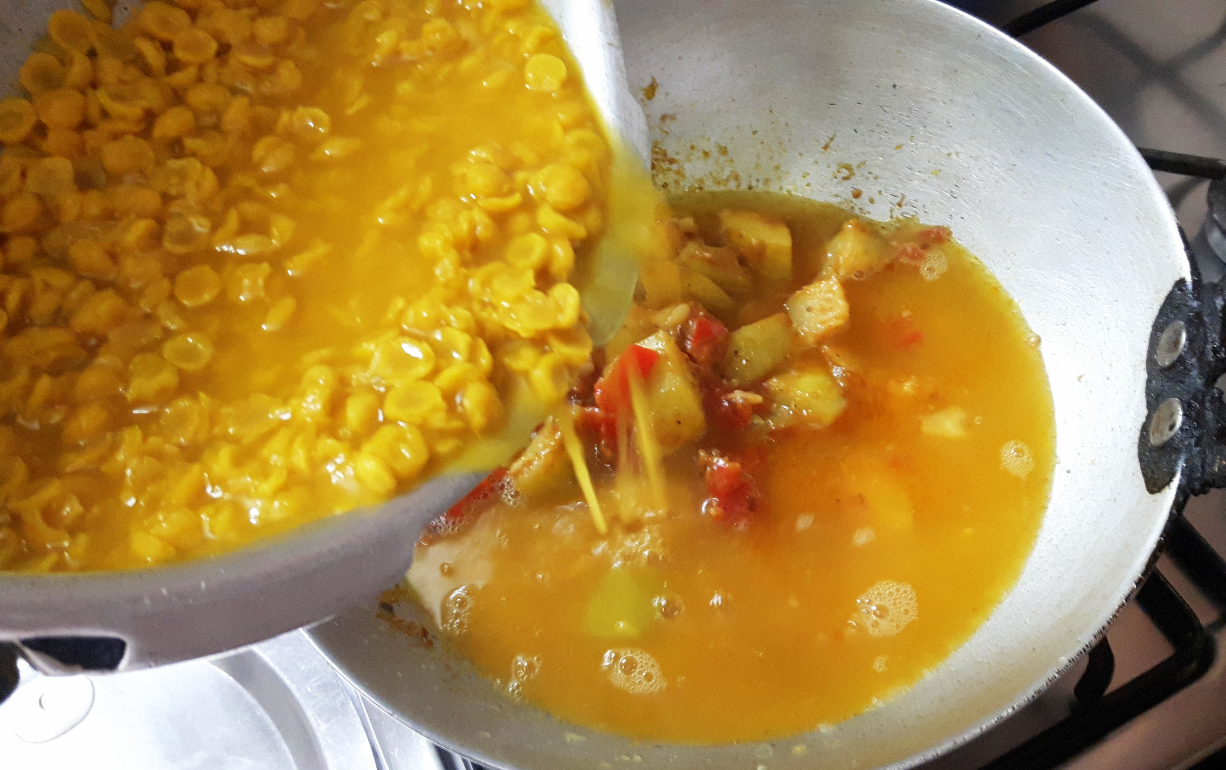 Add cooked dal