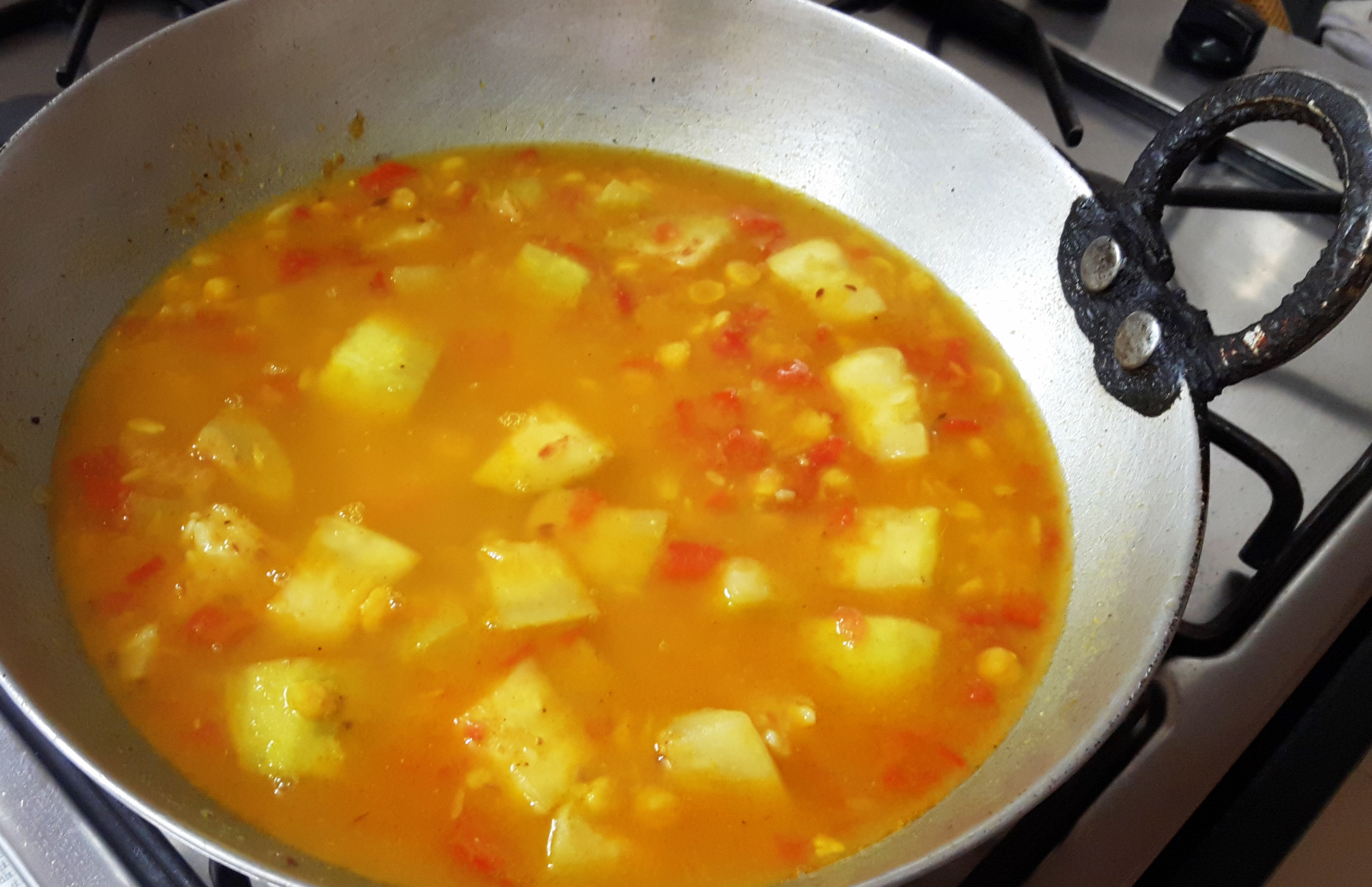 Add cooked dal